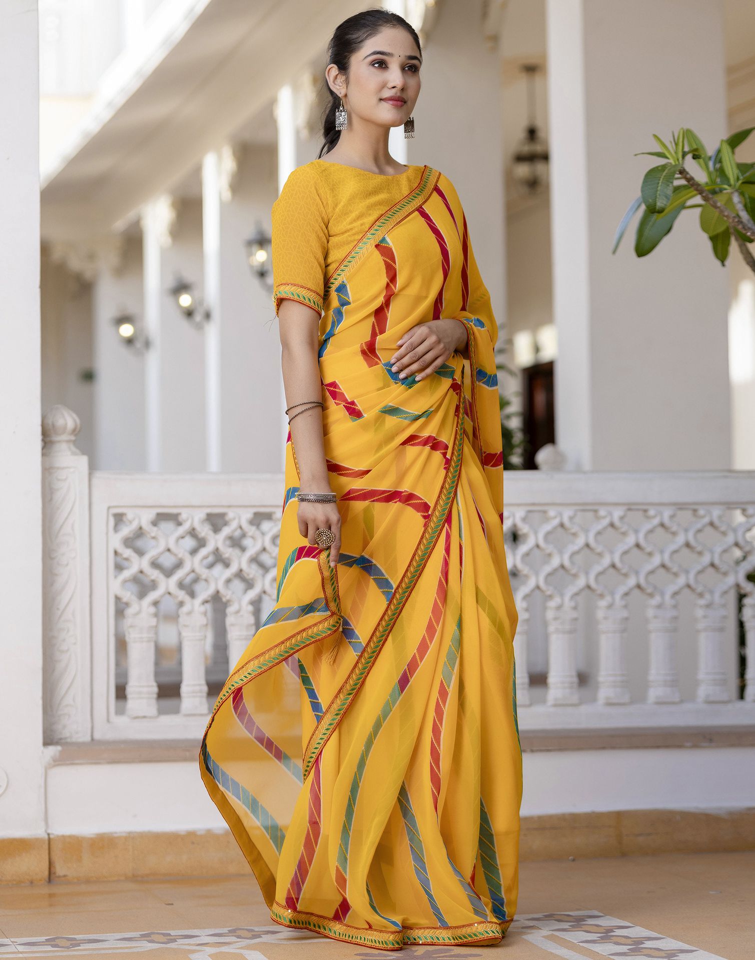 Yellow Georgette printed Saree