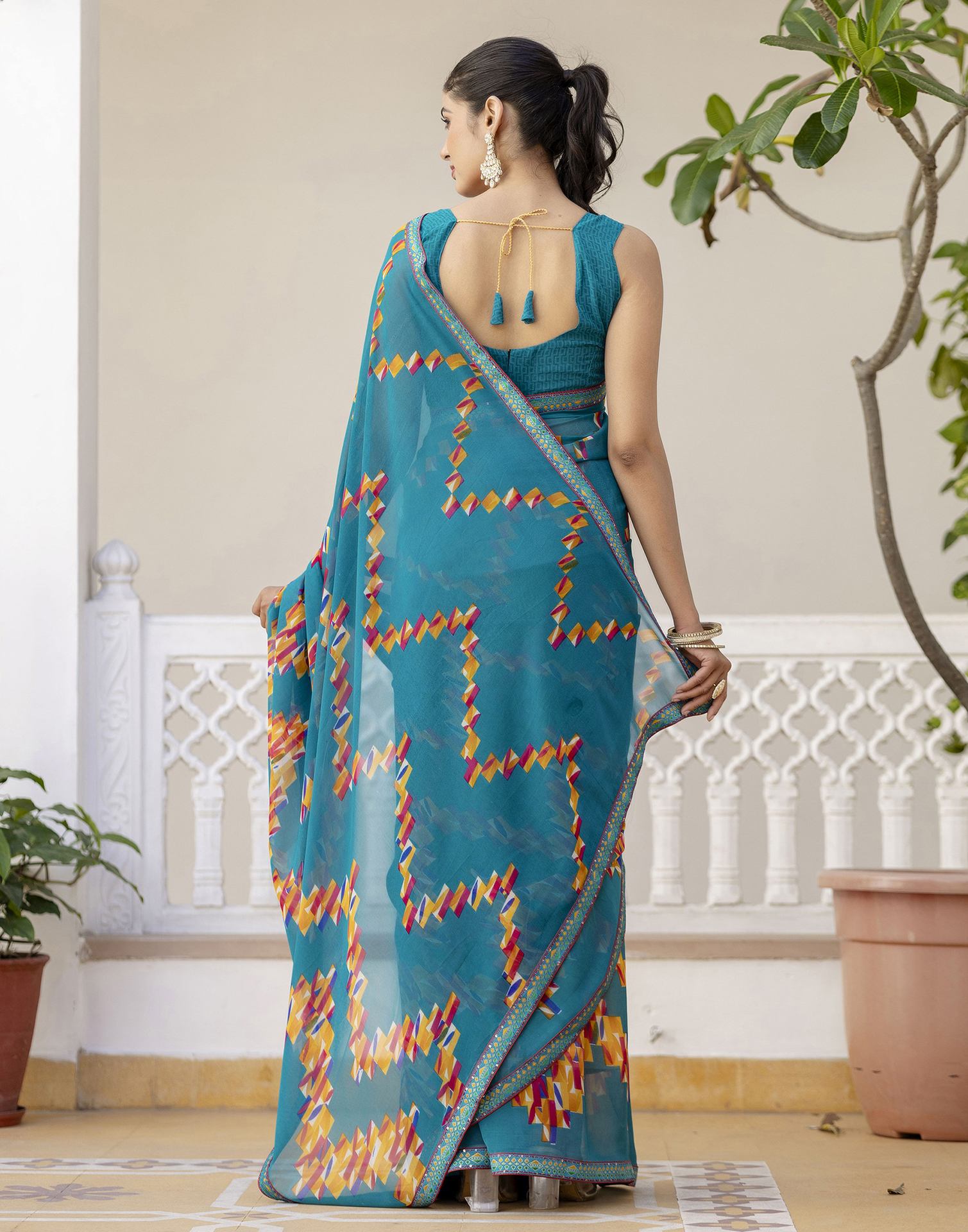 Teal Green Georgette printed Saree
