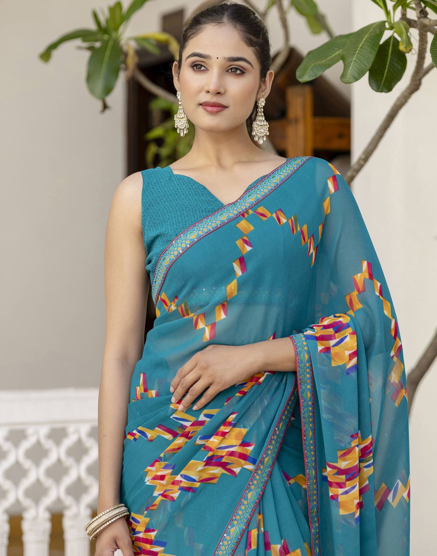 Teal Green Georgette printed Saree