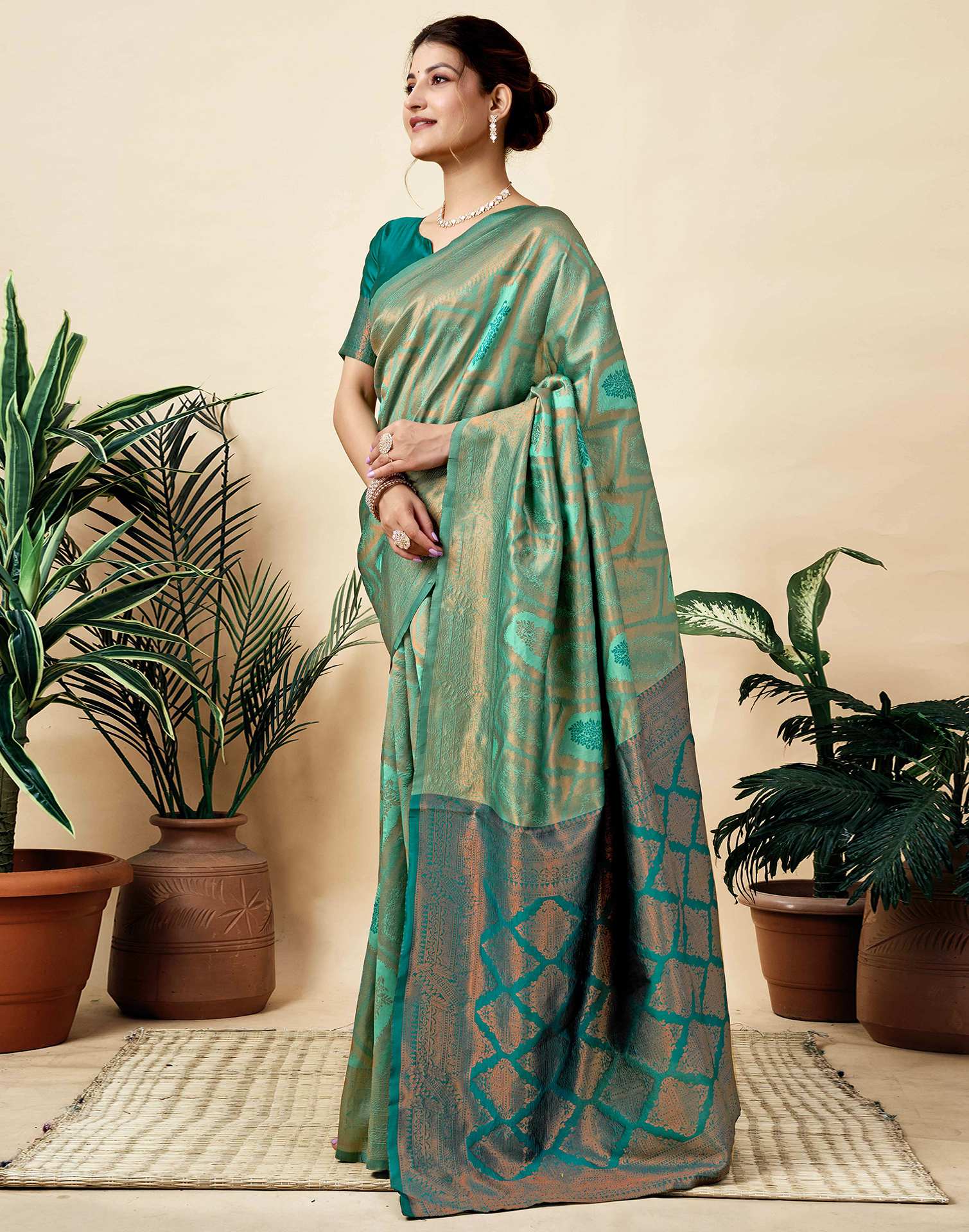 Teal Green Silk Woven Saree