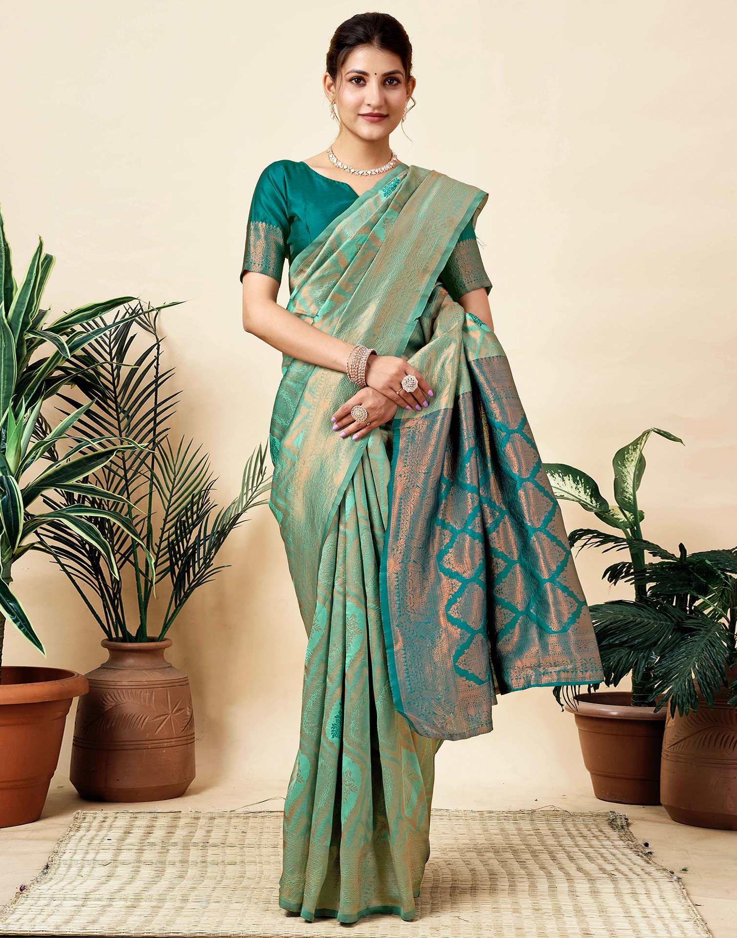 Teal Green Silk Woven Saree