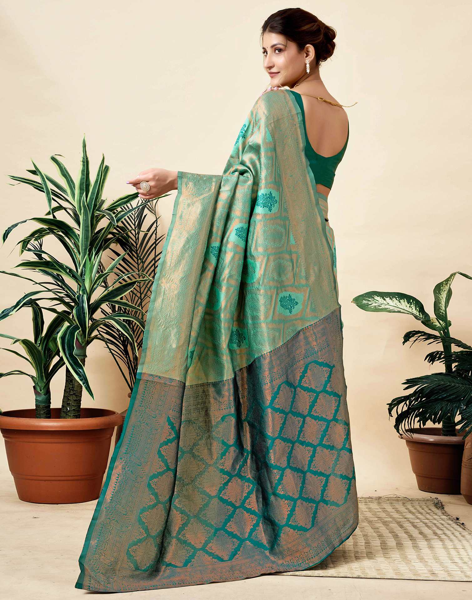 Teal Green Silk Woven Saree