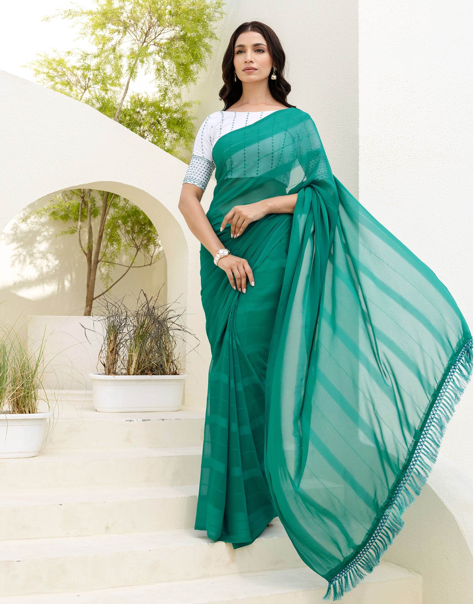 Teal Green Georgette Woven Stripe Plain Saree