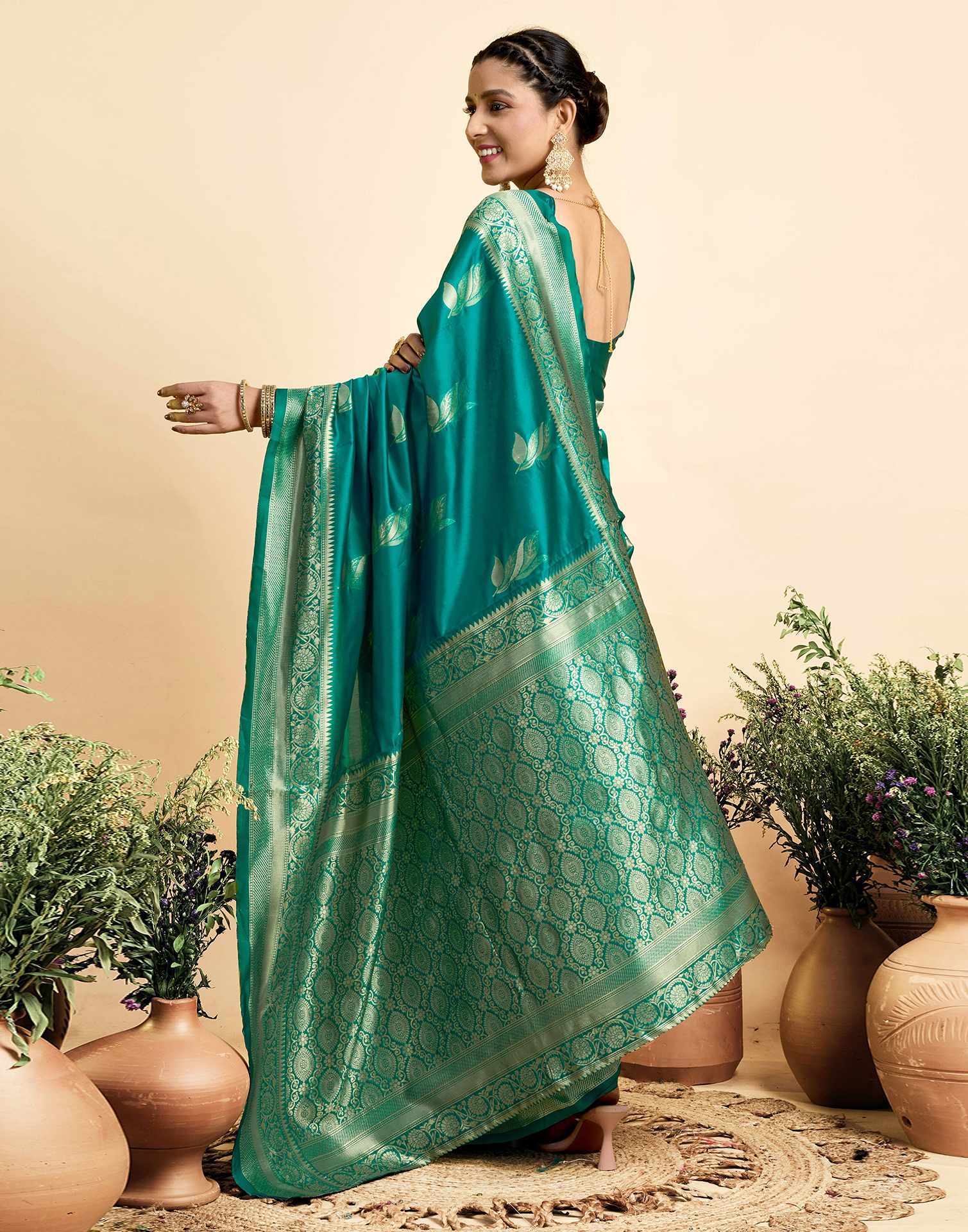 Teal Green Silk Woven Saree