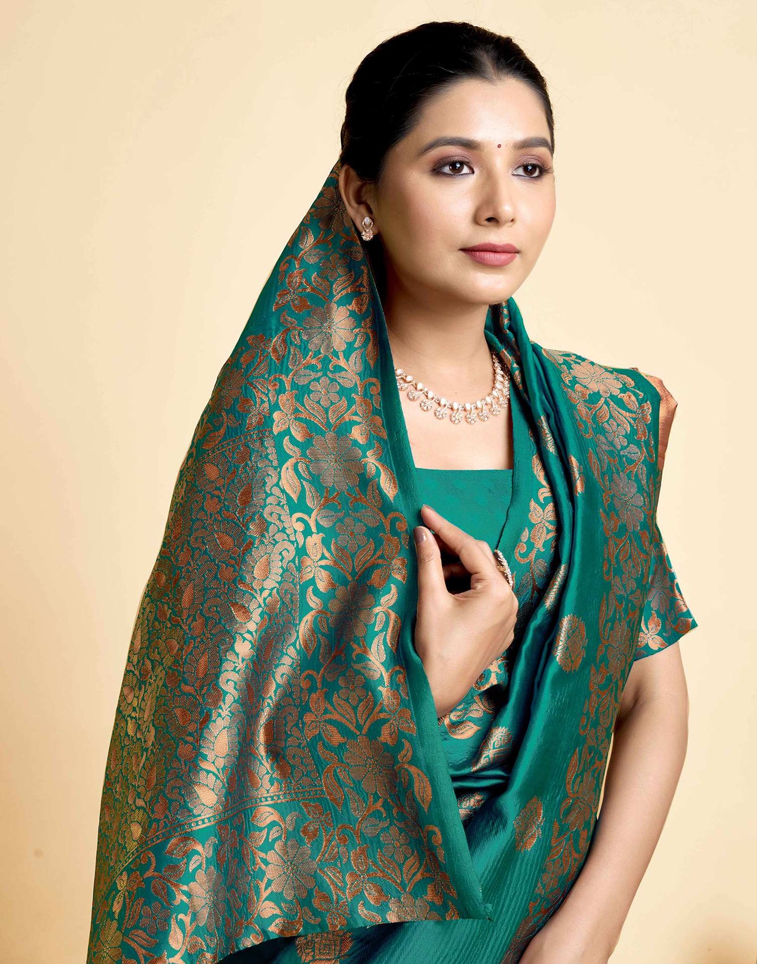 Teal Green Silk Woven Saree