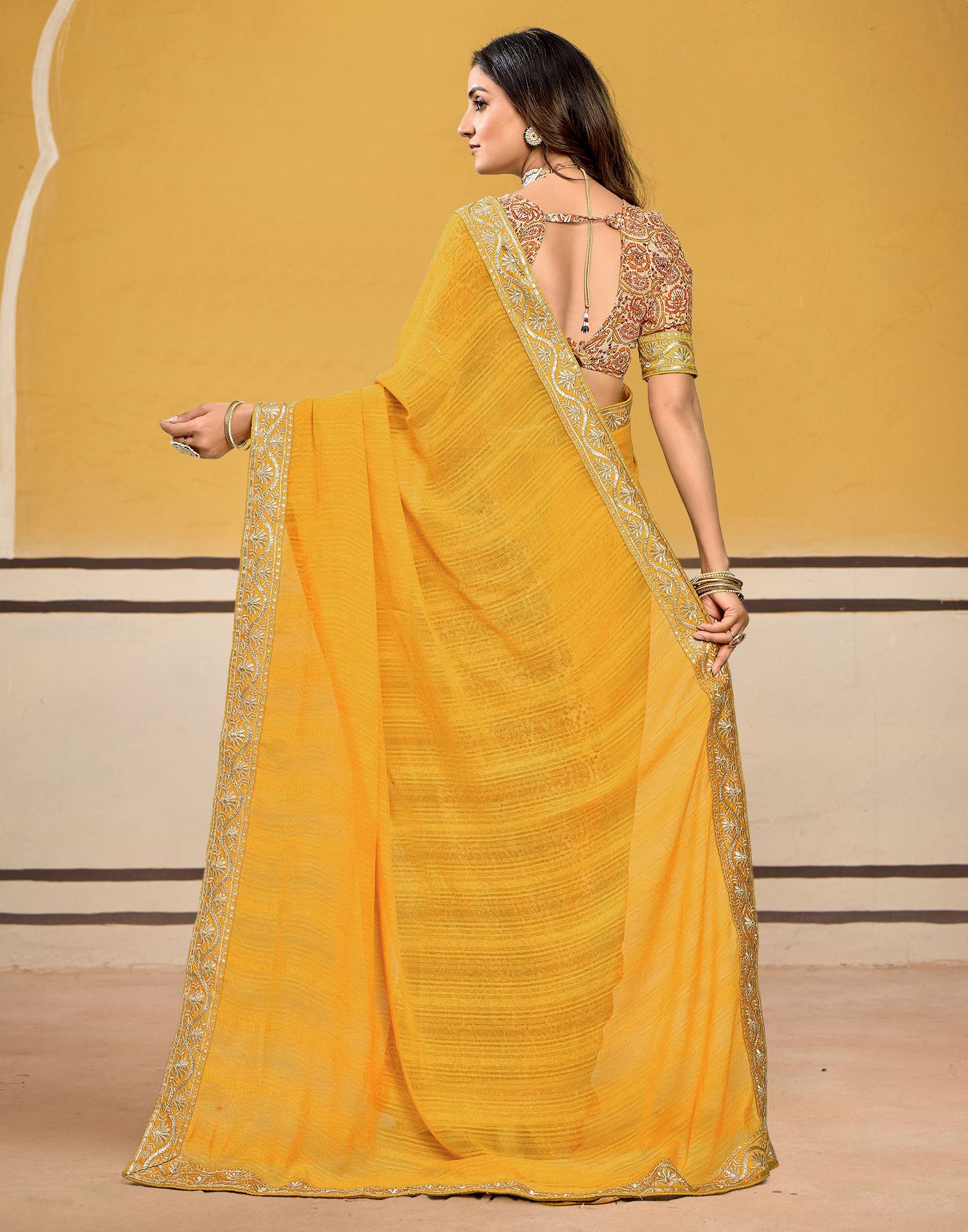 Turmeric Yellow Georgette Printed Saree