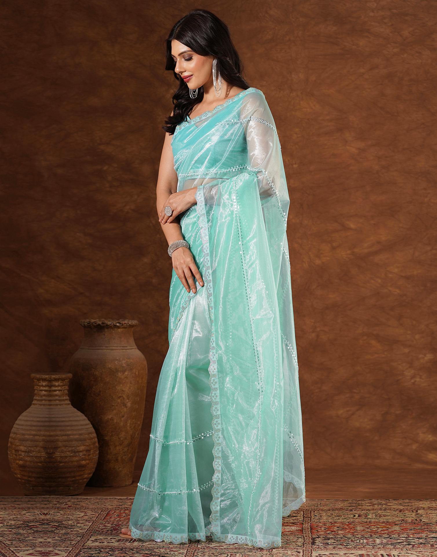 Turquoise Net Embroidery Saree
