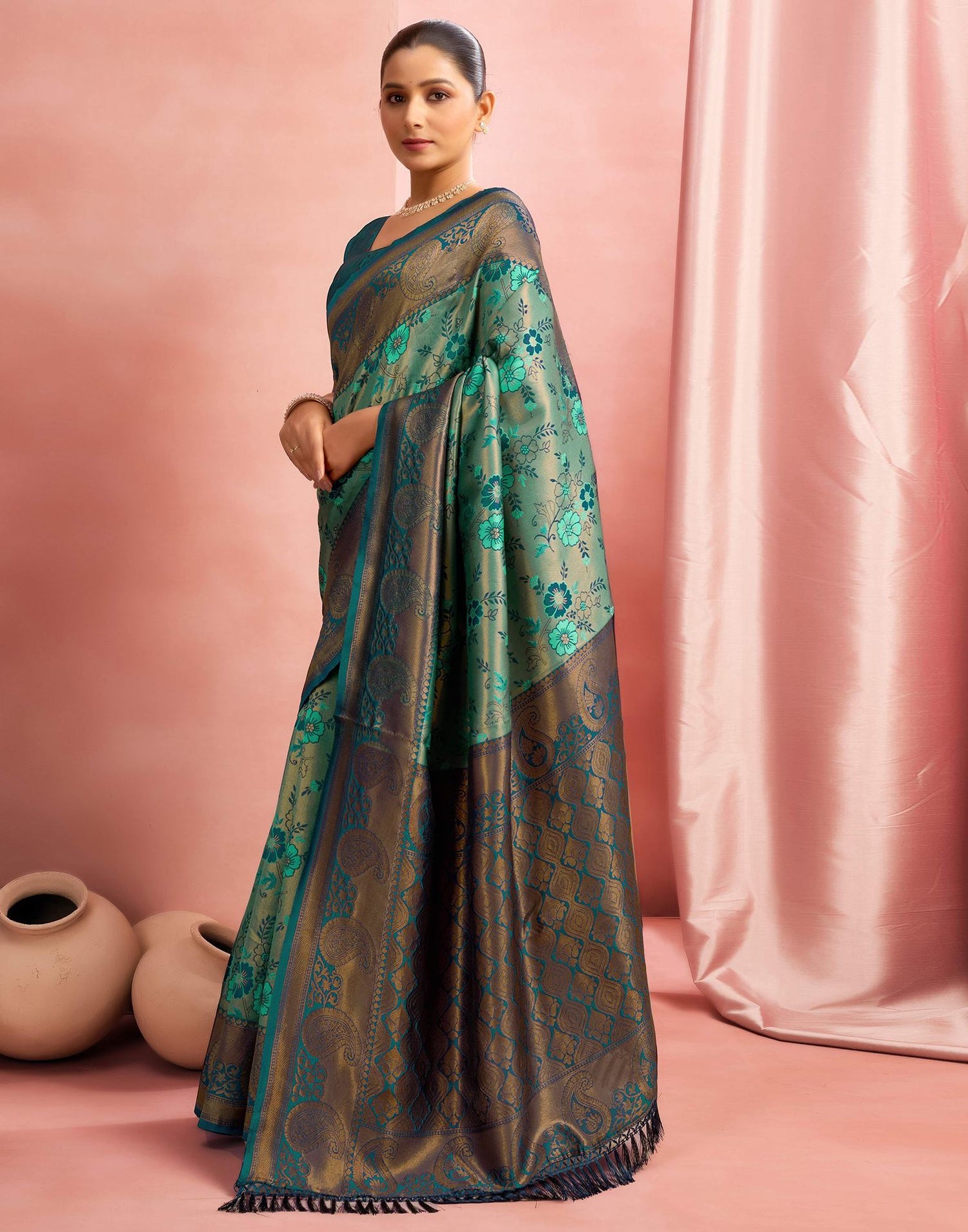 Teal Green Silk Woven Saree