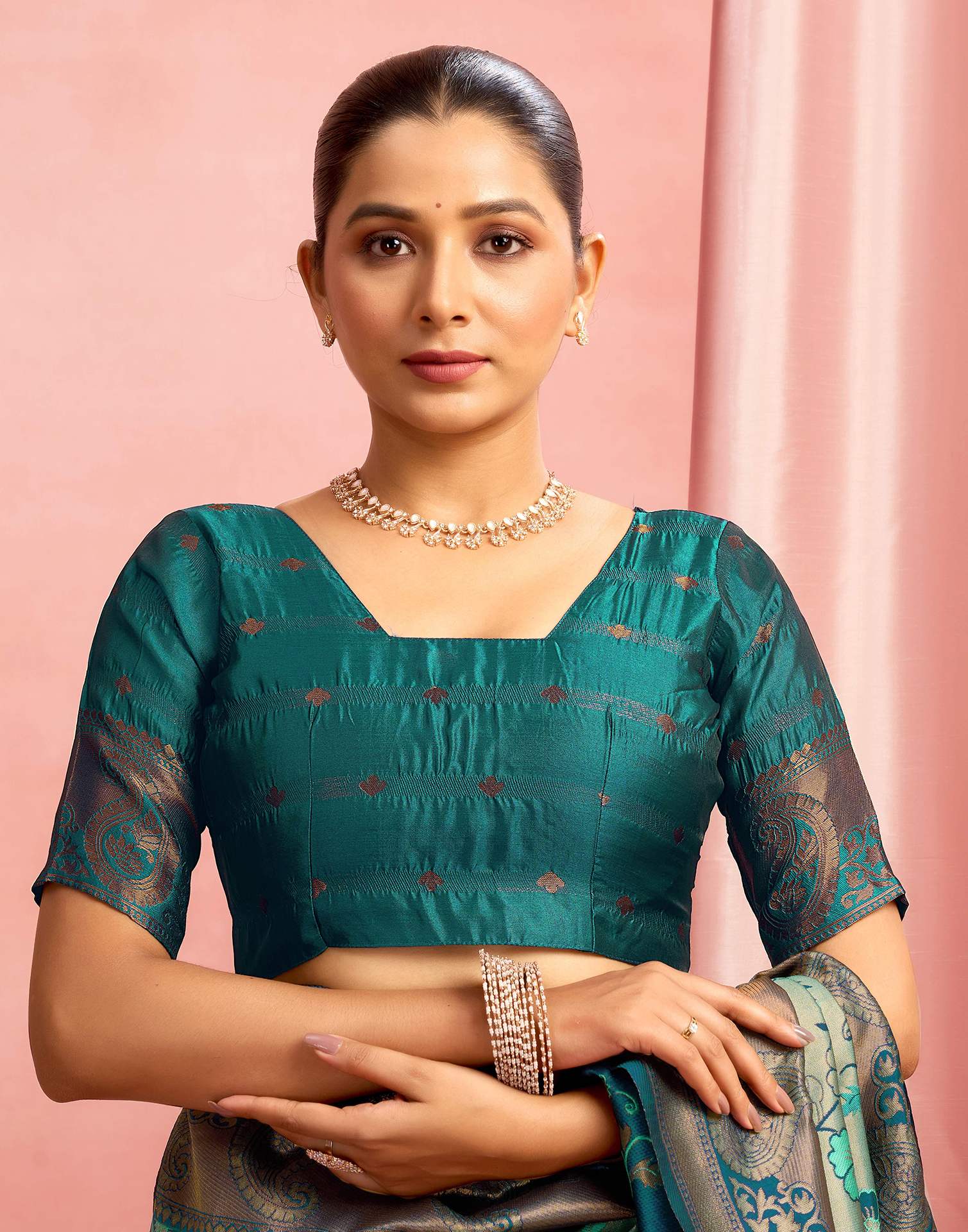 Teal Green Silk Woven Saree