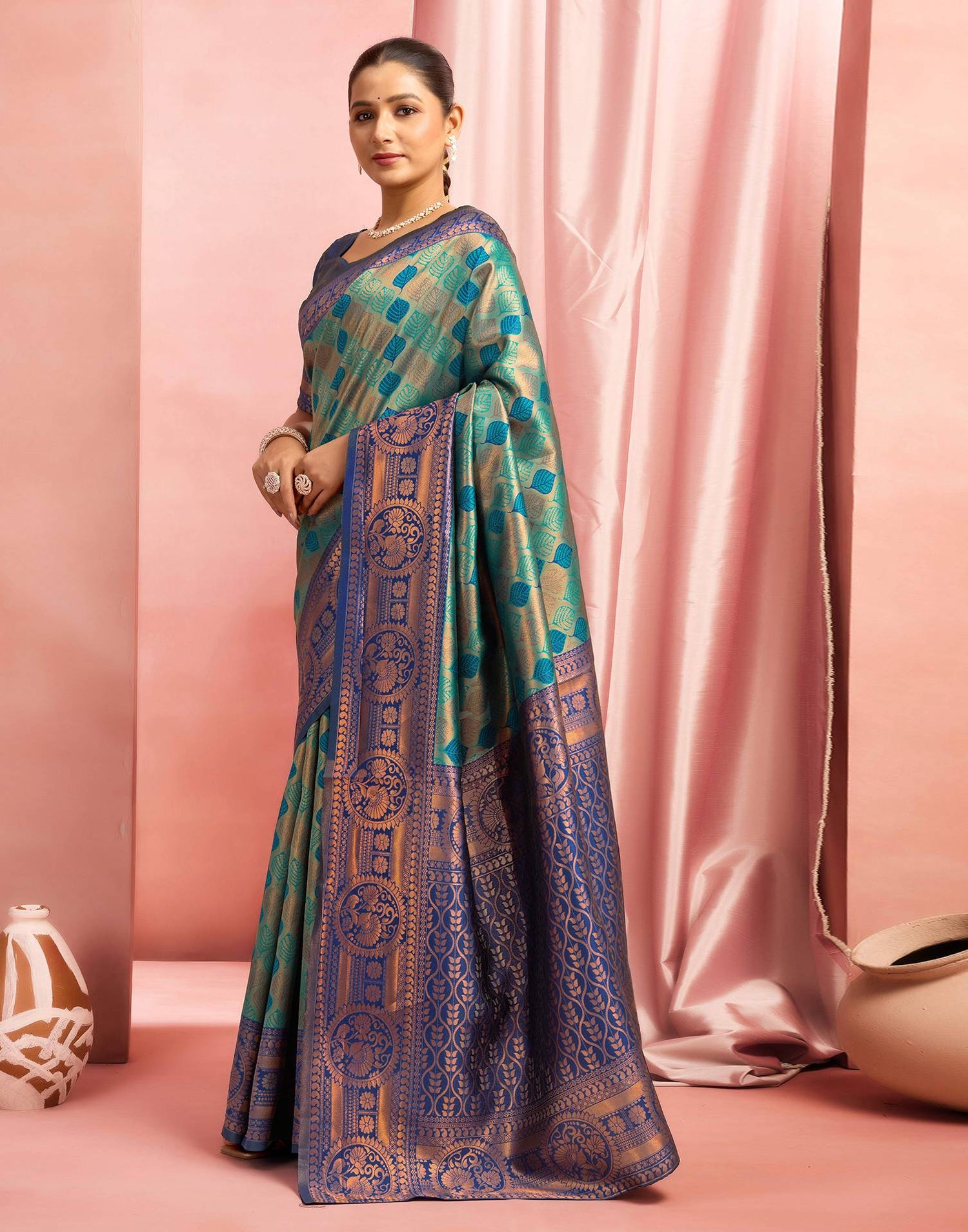 Teal Green Silk Woven Saree