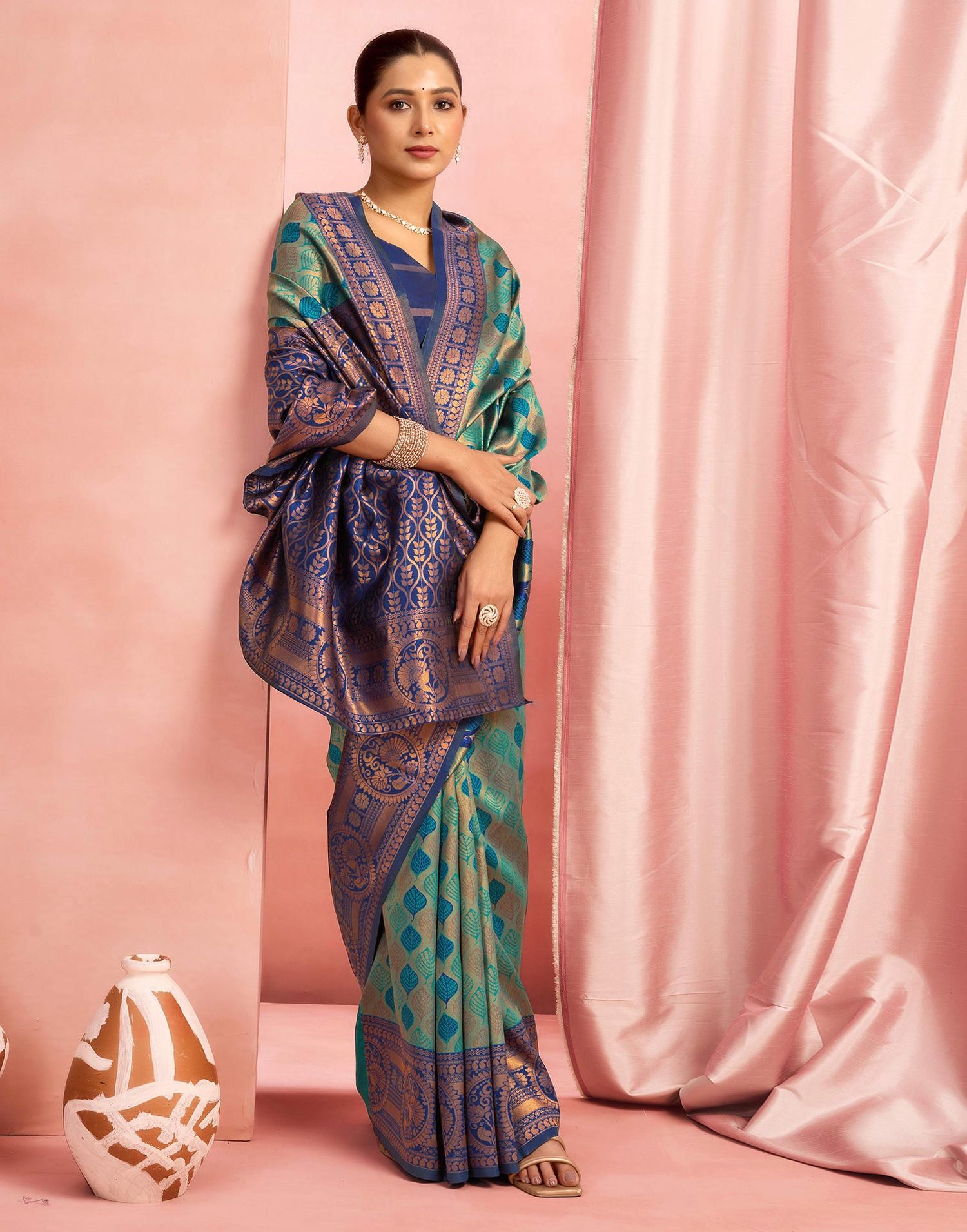 Teal Green Silk Woven Saree