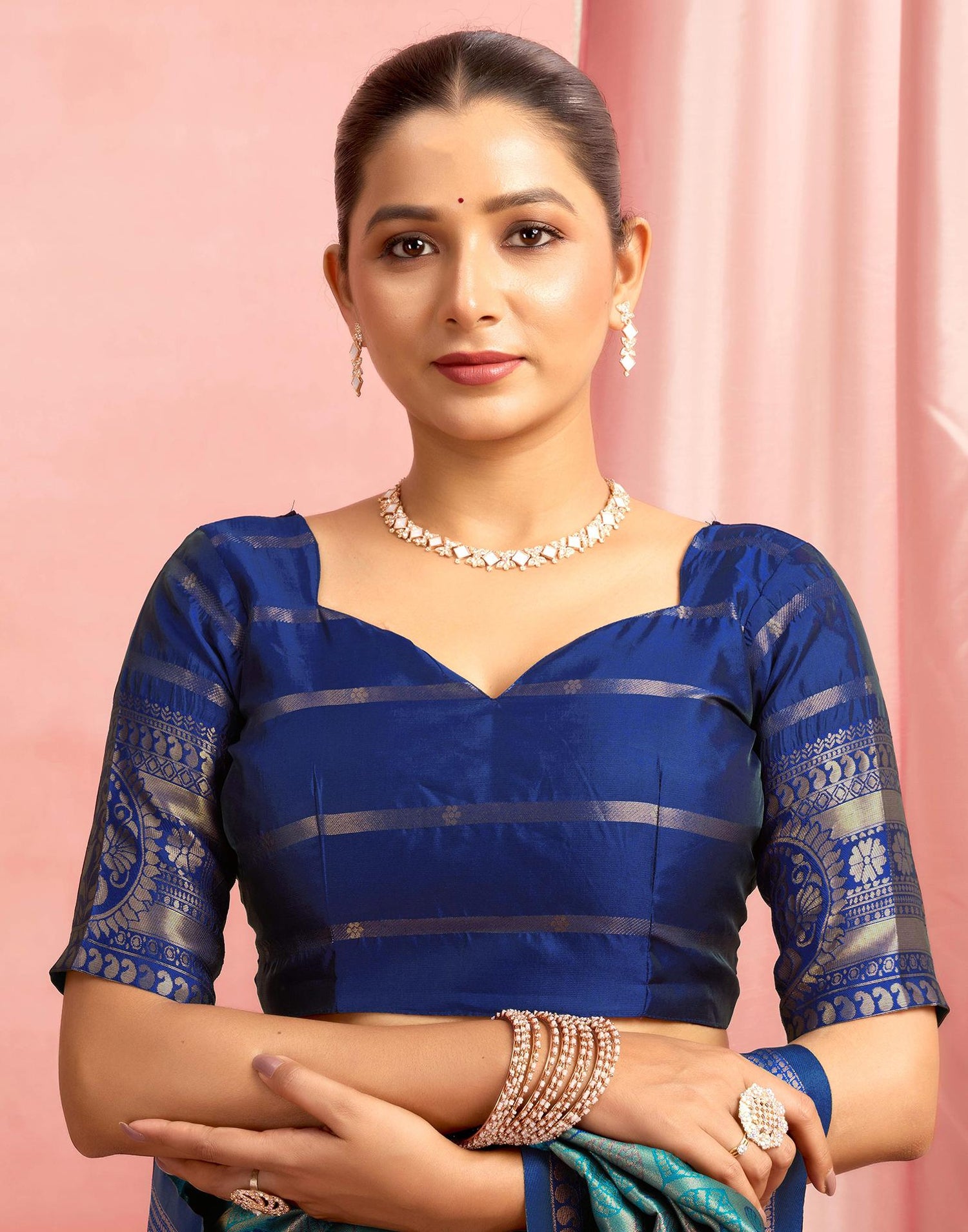 Teal Green Silk Woven Saree