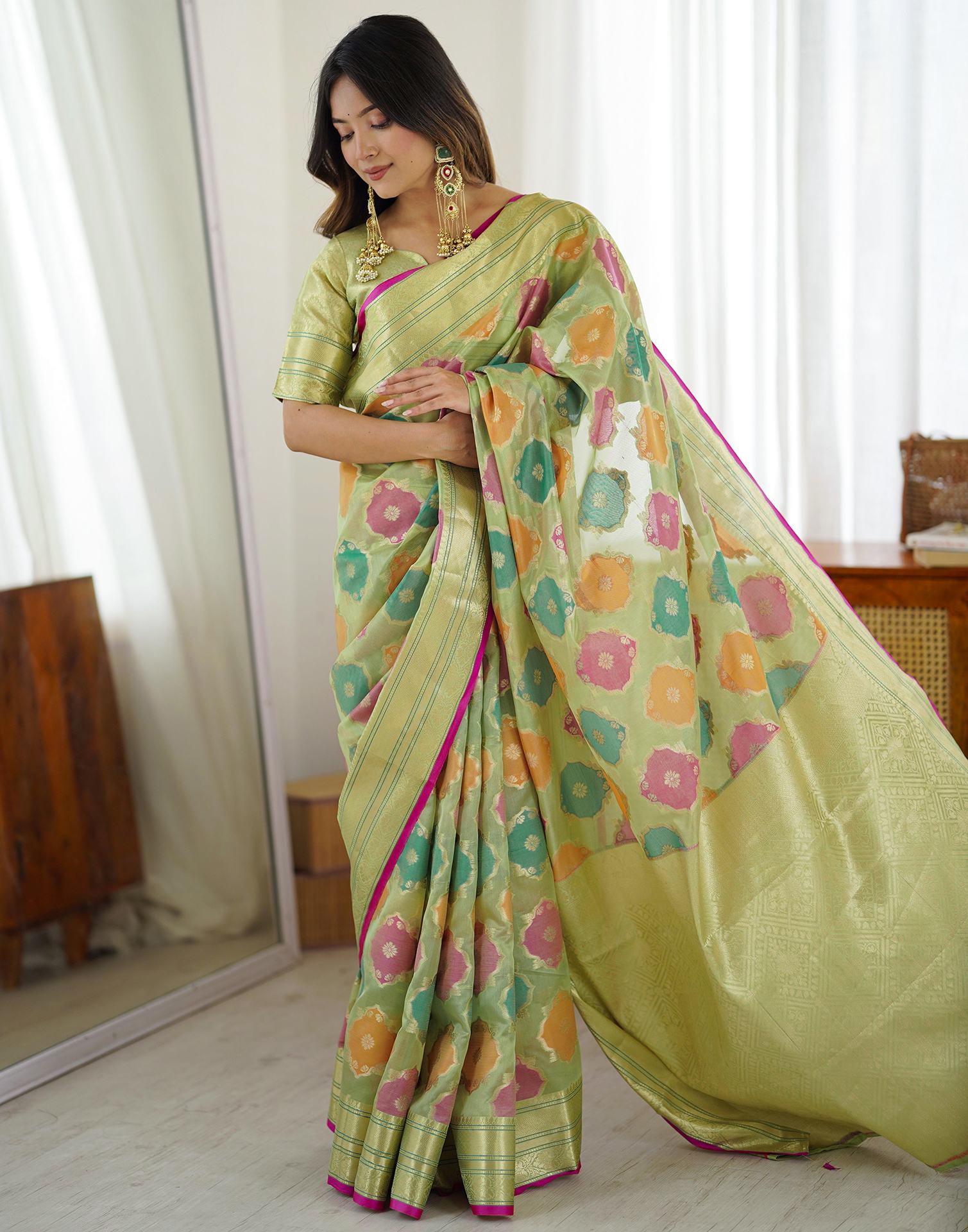 Pista Green Silk Woven Saree