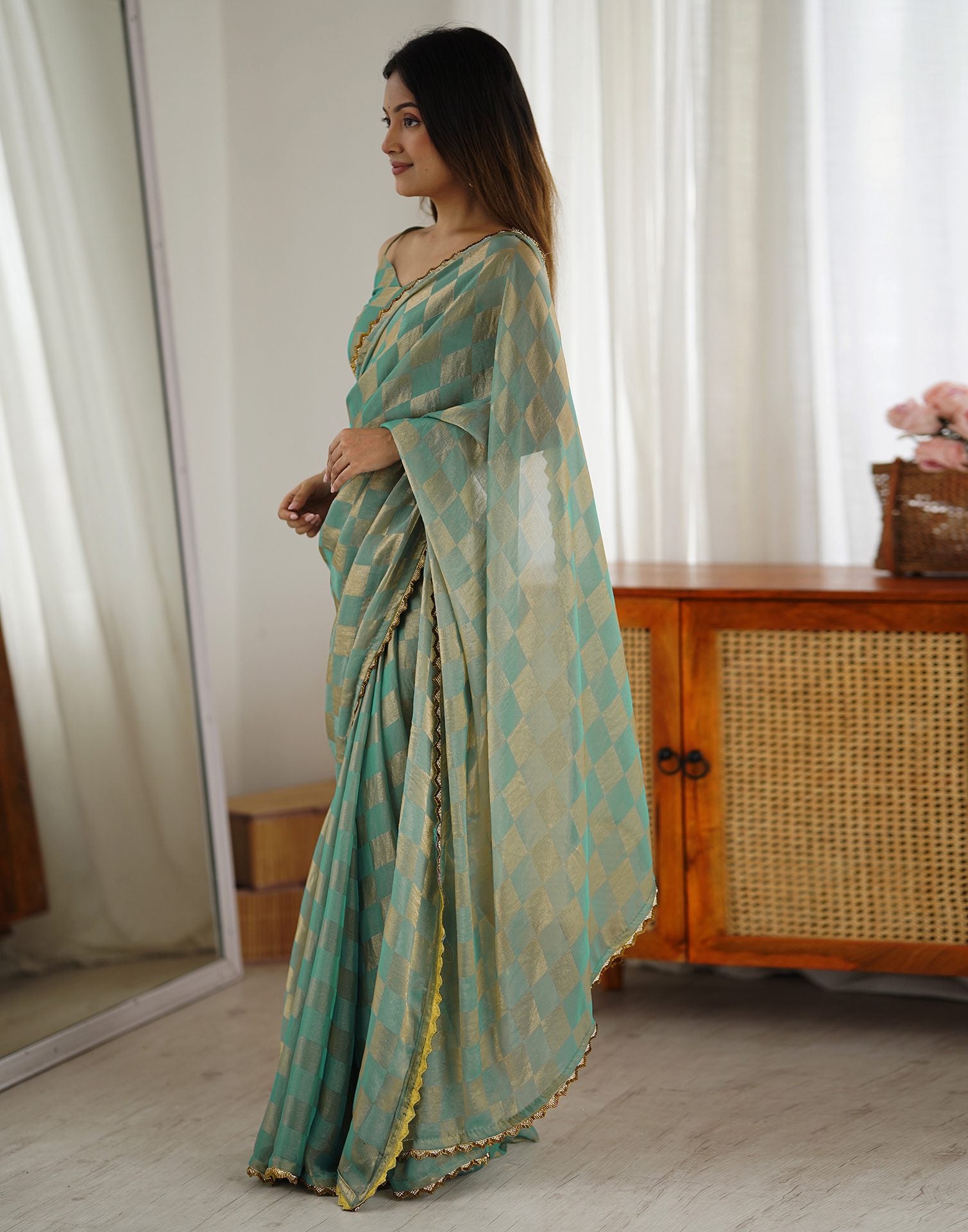 Teal Green Shimmer Woven Saree