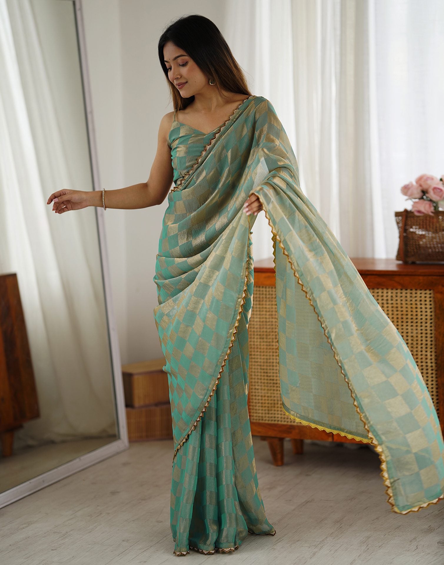 Teal Green Shimmer Woven Saree