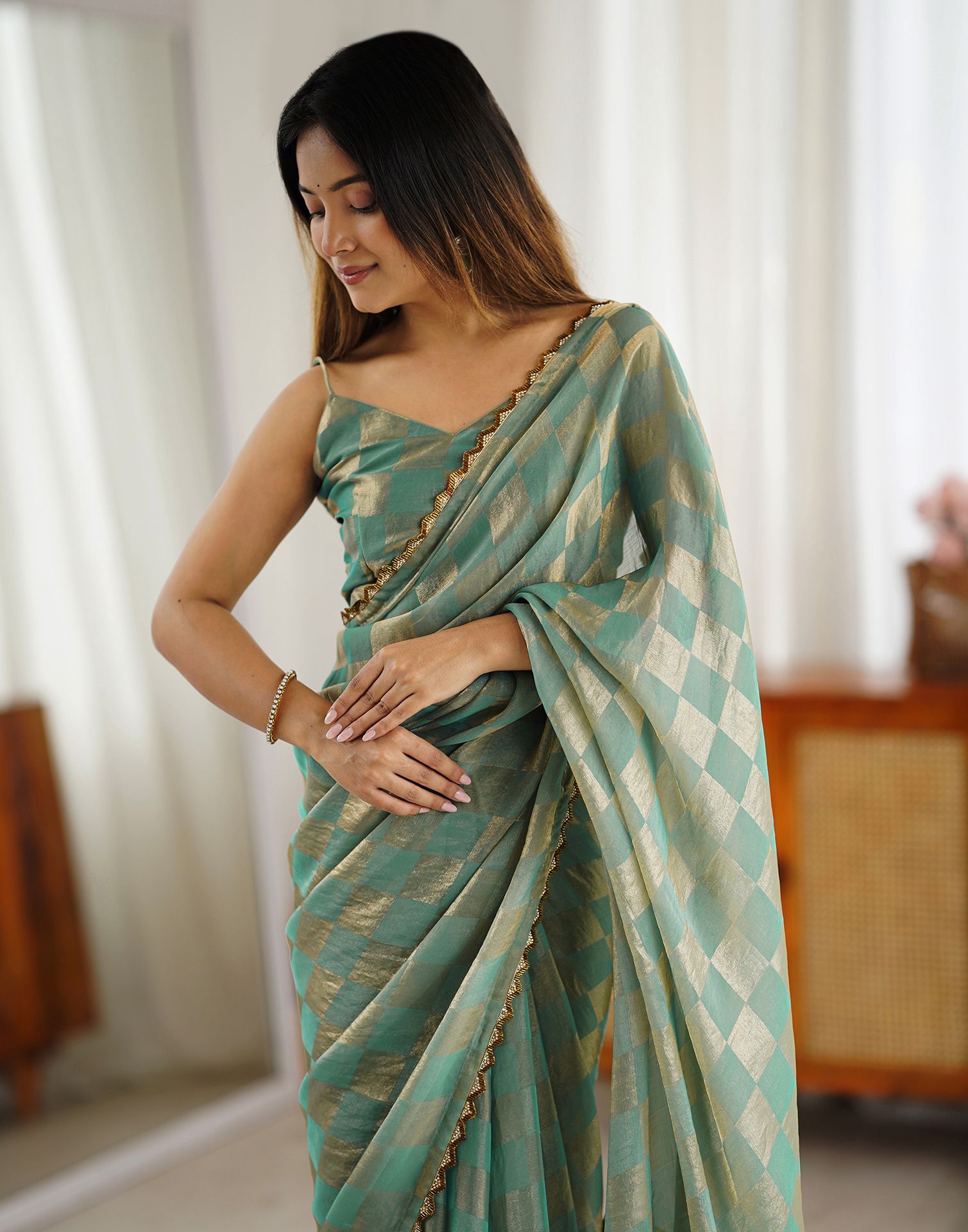 Teal Green Shimmer Woven Saree