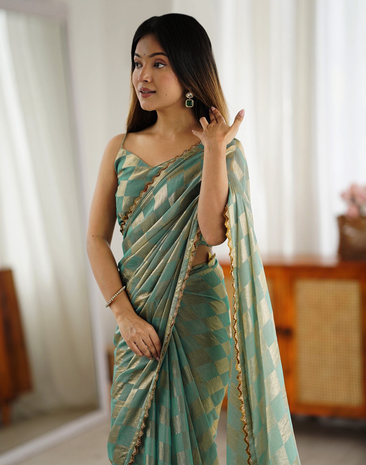 Teal Green Shimmer Woven Saree