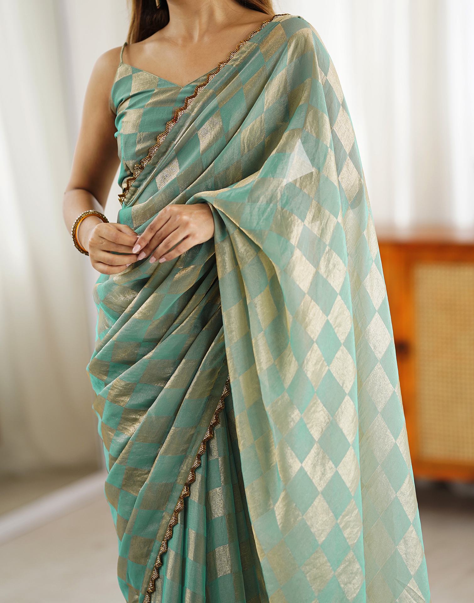 Teal Green Shimmer Woven Saree