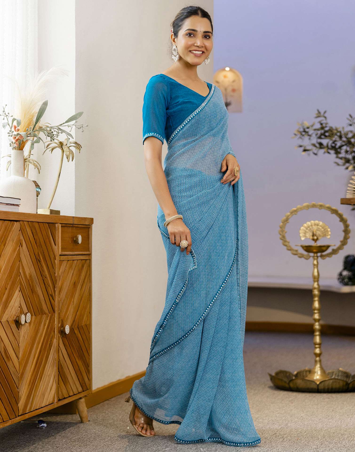 Teal Blue Georgette Printed Saree