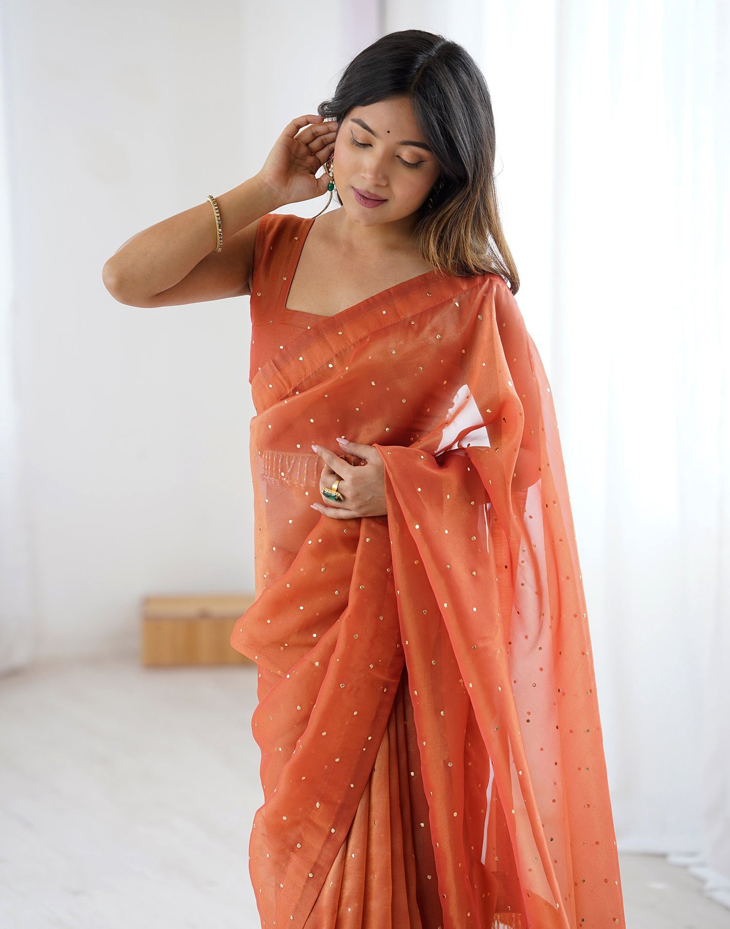 Rust Shimmer Foil Printed Saree