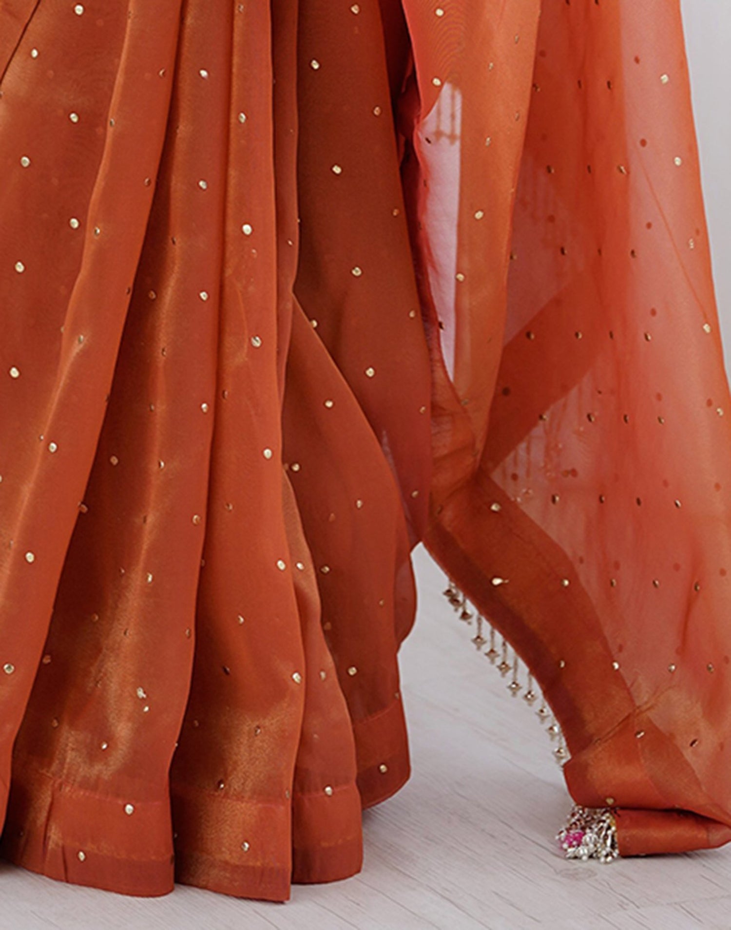 Rust Shimmer Foil Printed Saree