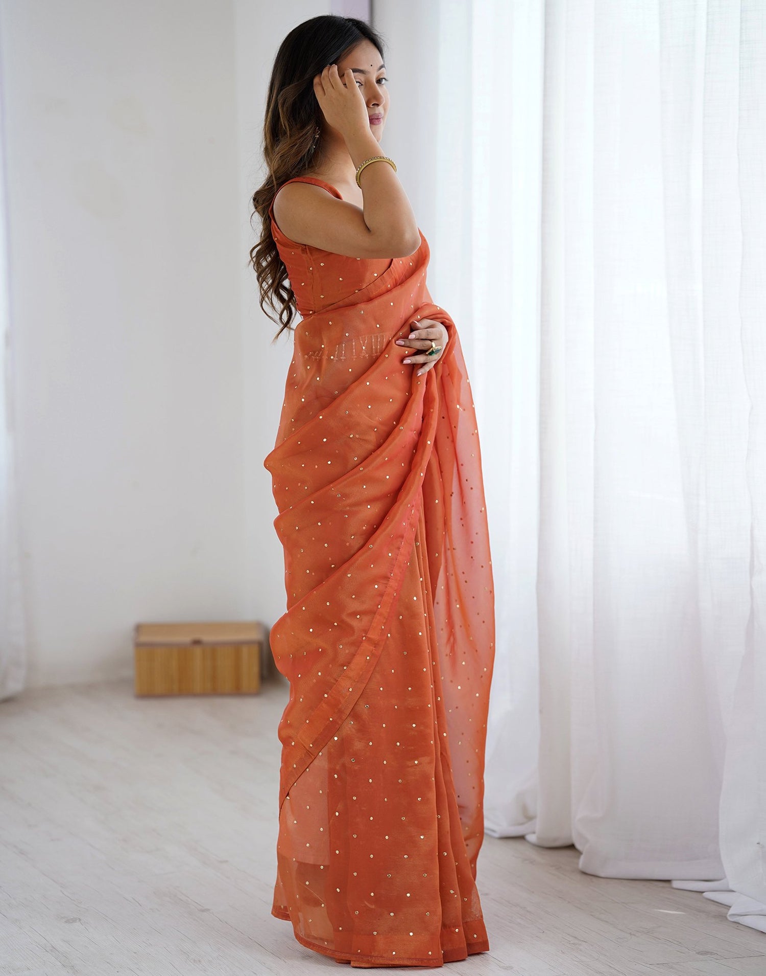 Rust Shimmer Foil Printed Saree