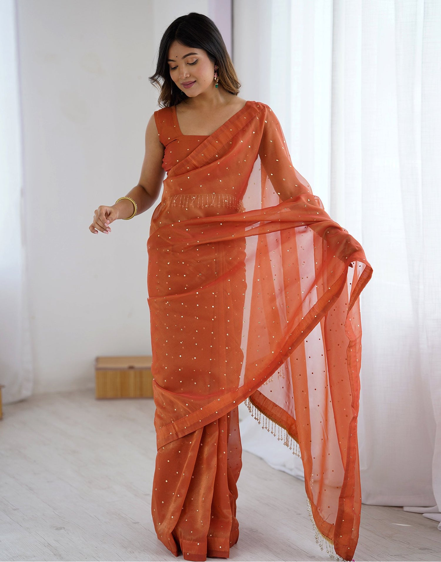 Rust Shimmer Foil Printed Saree