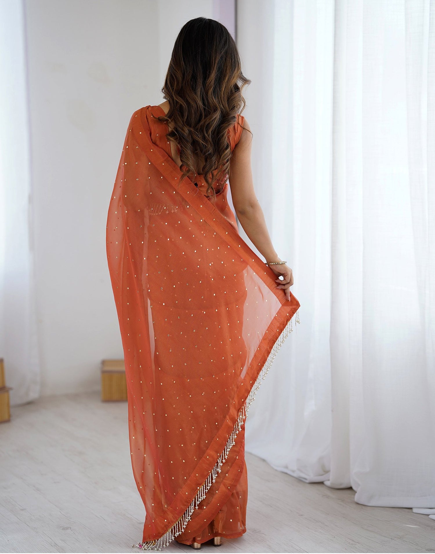 Rust Shimmer Foil Printed Saree