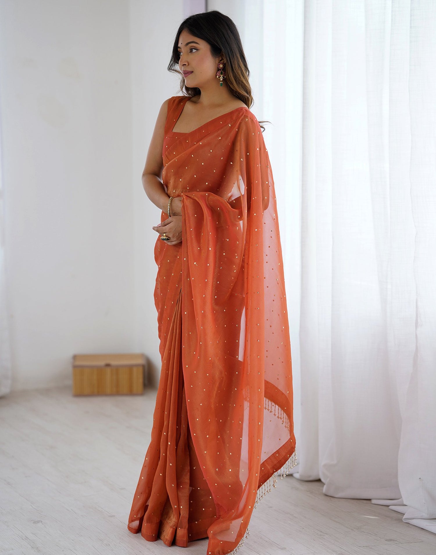 Rust Shimmer Foil Printed Saree