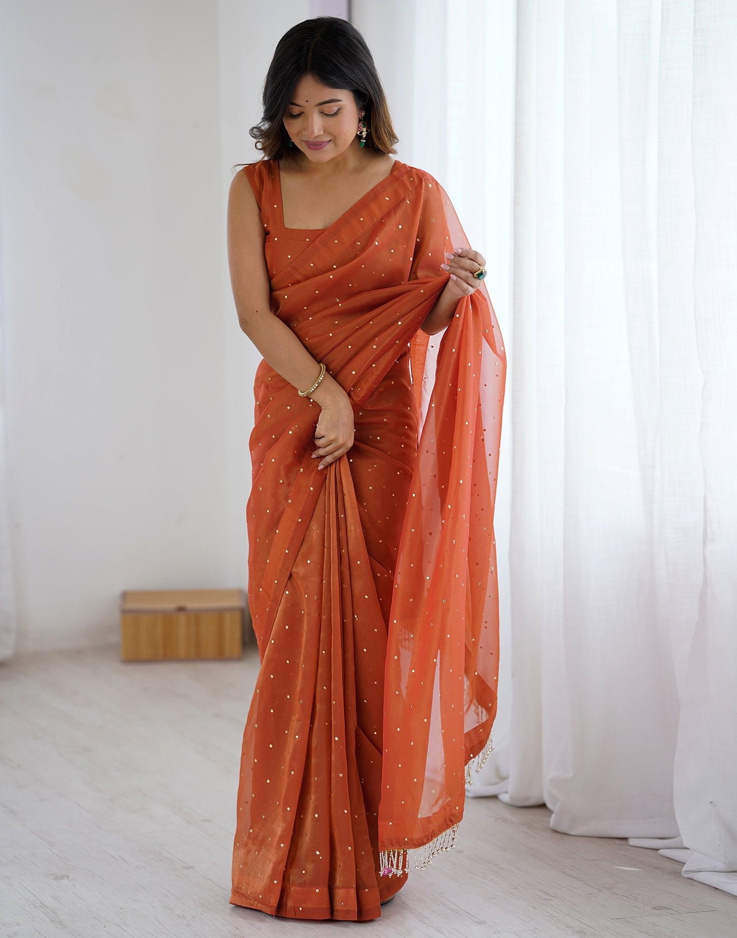 Rust Shimmer Foil Printed Saree