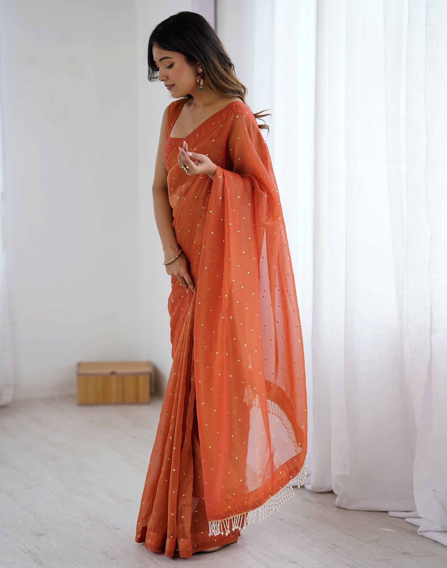Rust Shimmer Foil Printed Saree