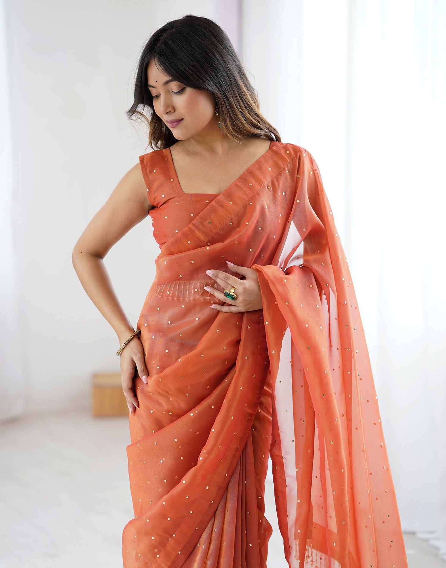 Rust Shimmer Foil Printed Saree