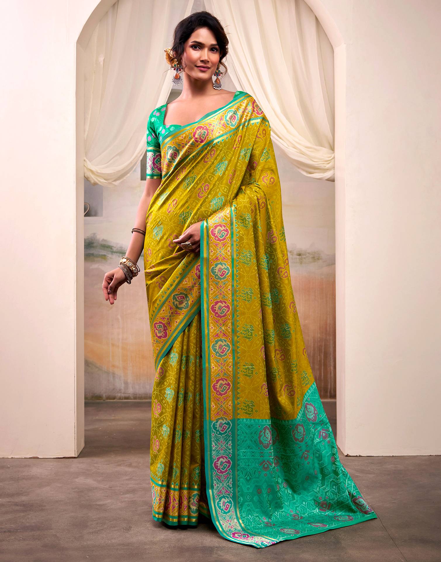 Mustard Green Silk Woven Patola Saree