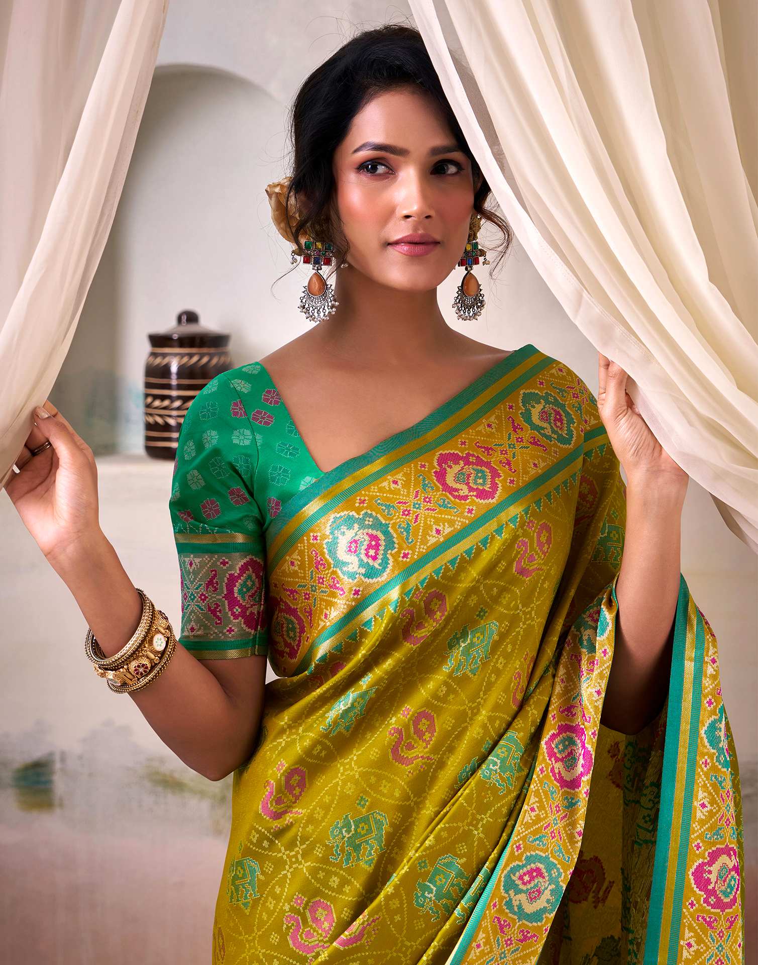 Mustard Green Silk Woven Patola Saree