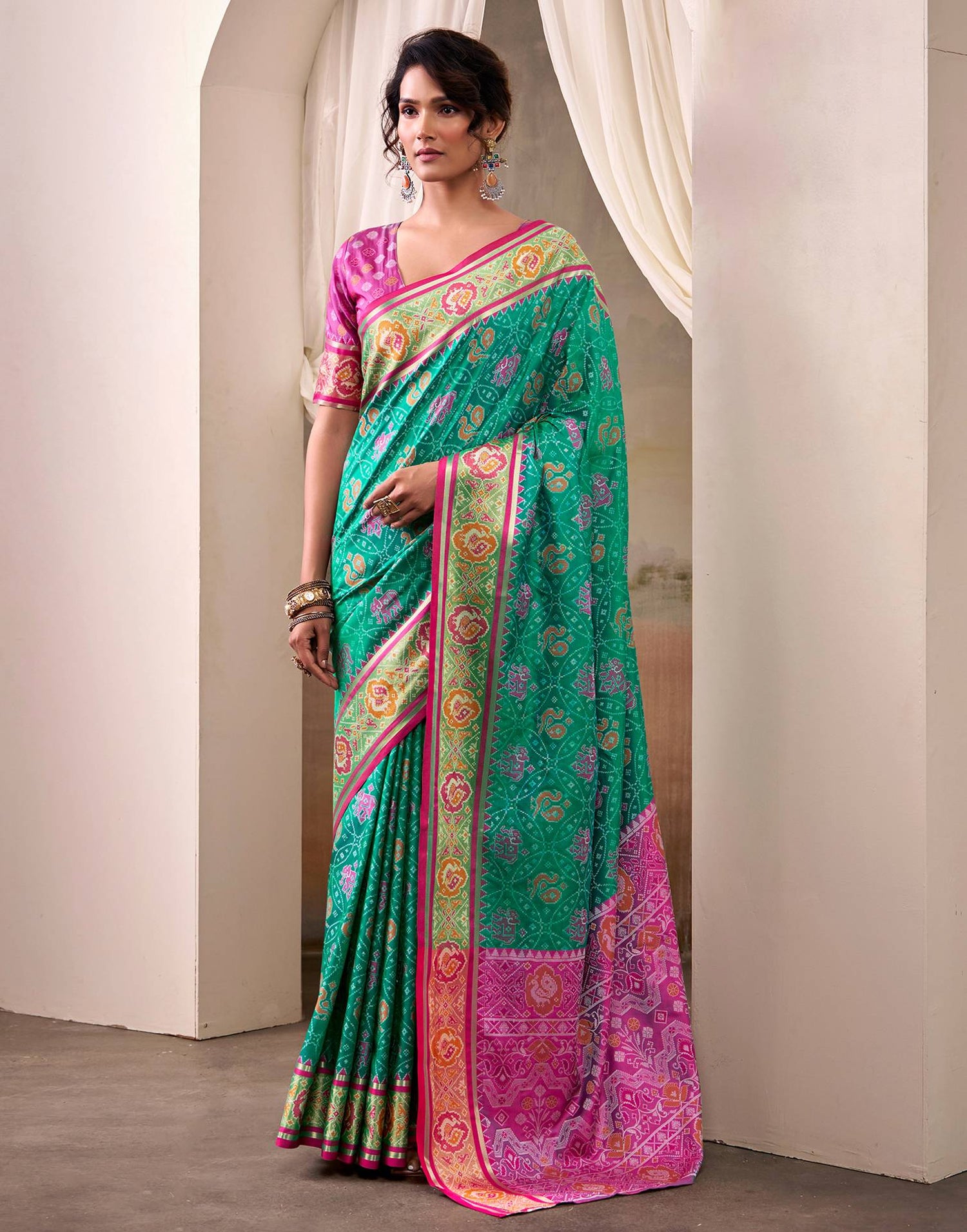 Teal Green Silk Woven Patola Saree