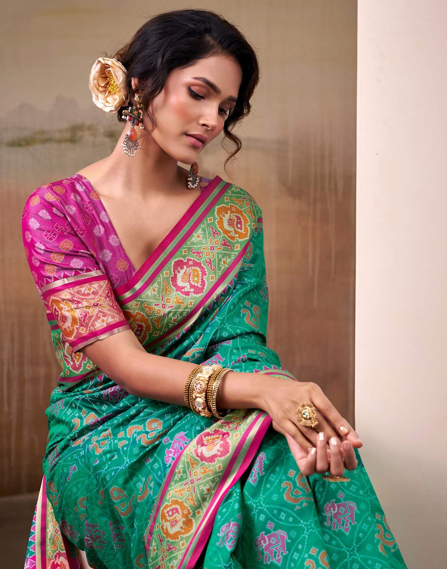 Teal Green Silk Woven Patola Saree