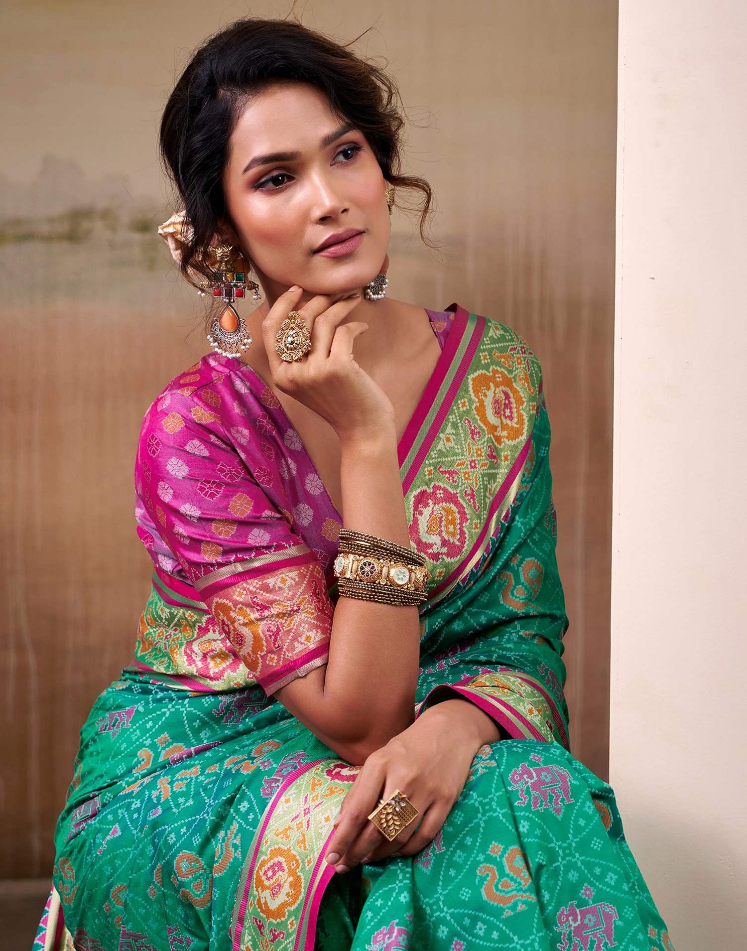 Teal Green Silk Woven Patola Saree