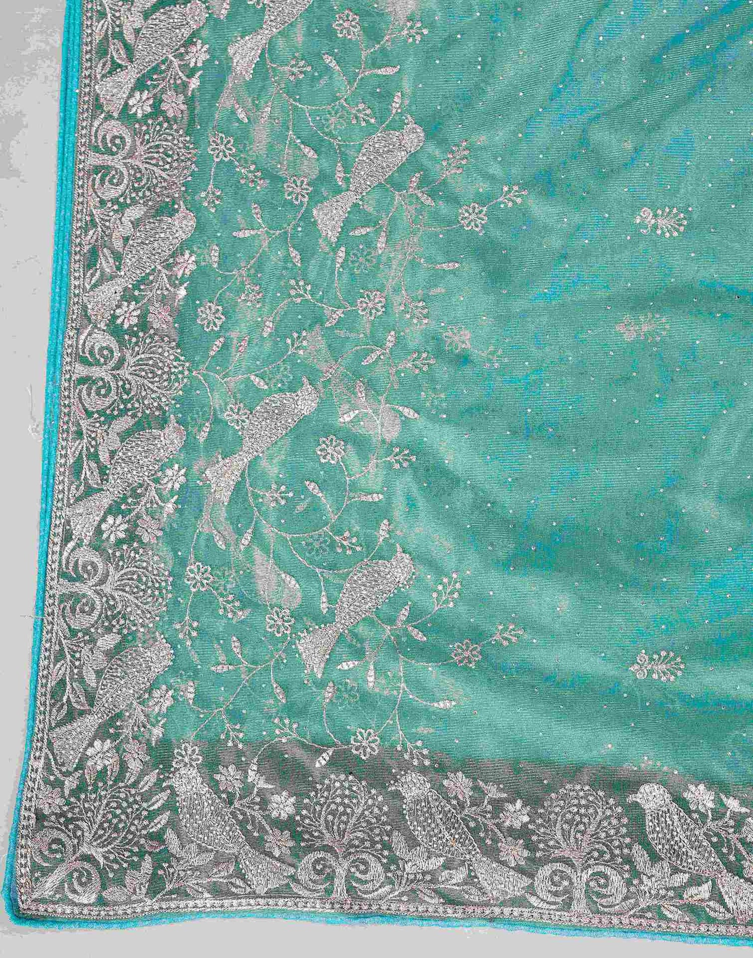 Turquoise Shimmer Net Embroidery Swarovski Saree