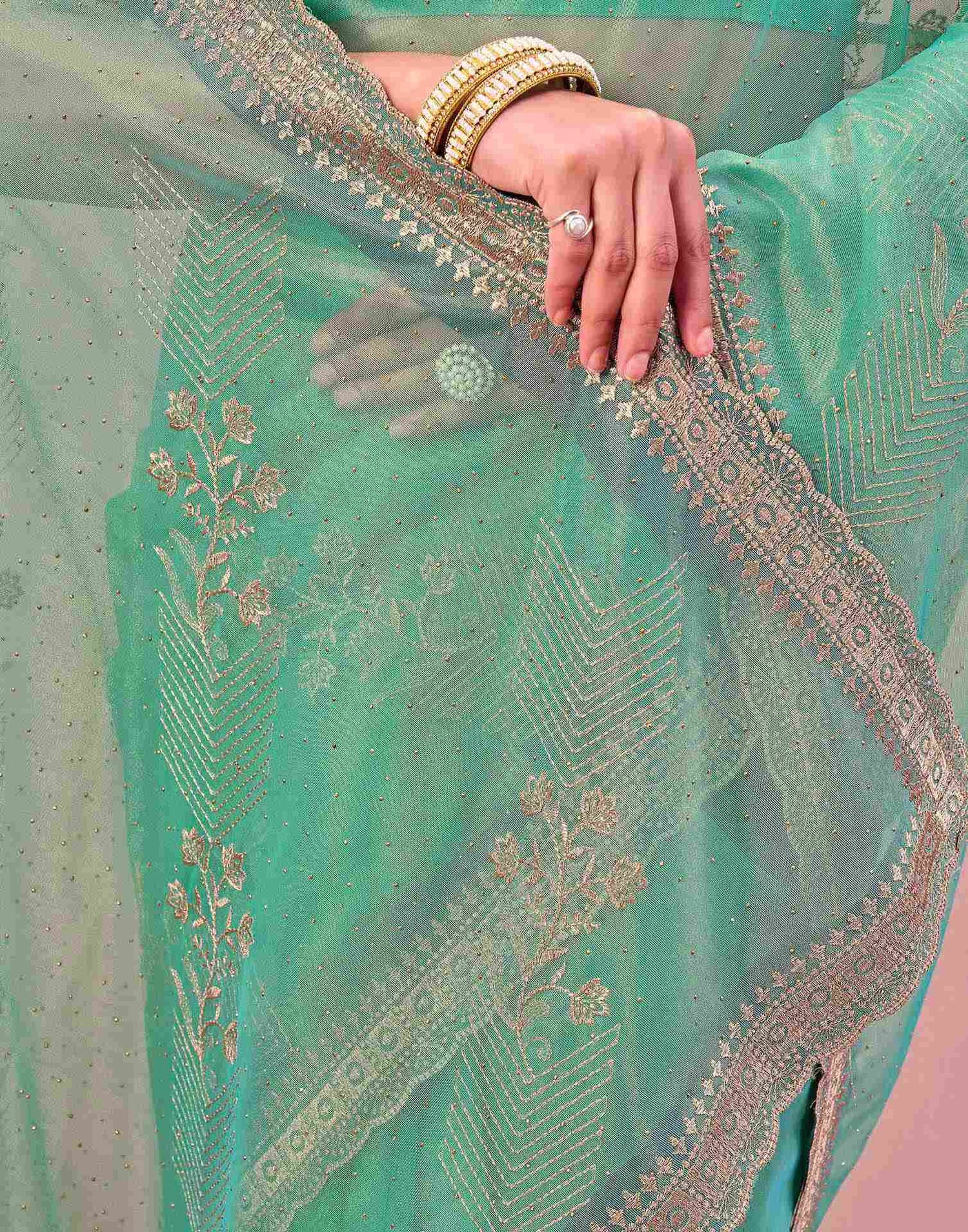 Turquoise Shimmer Net Embroidery Swarovski Saree