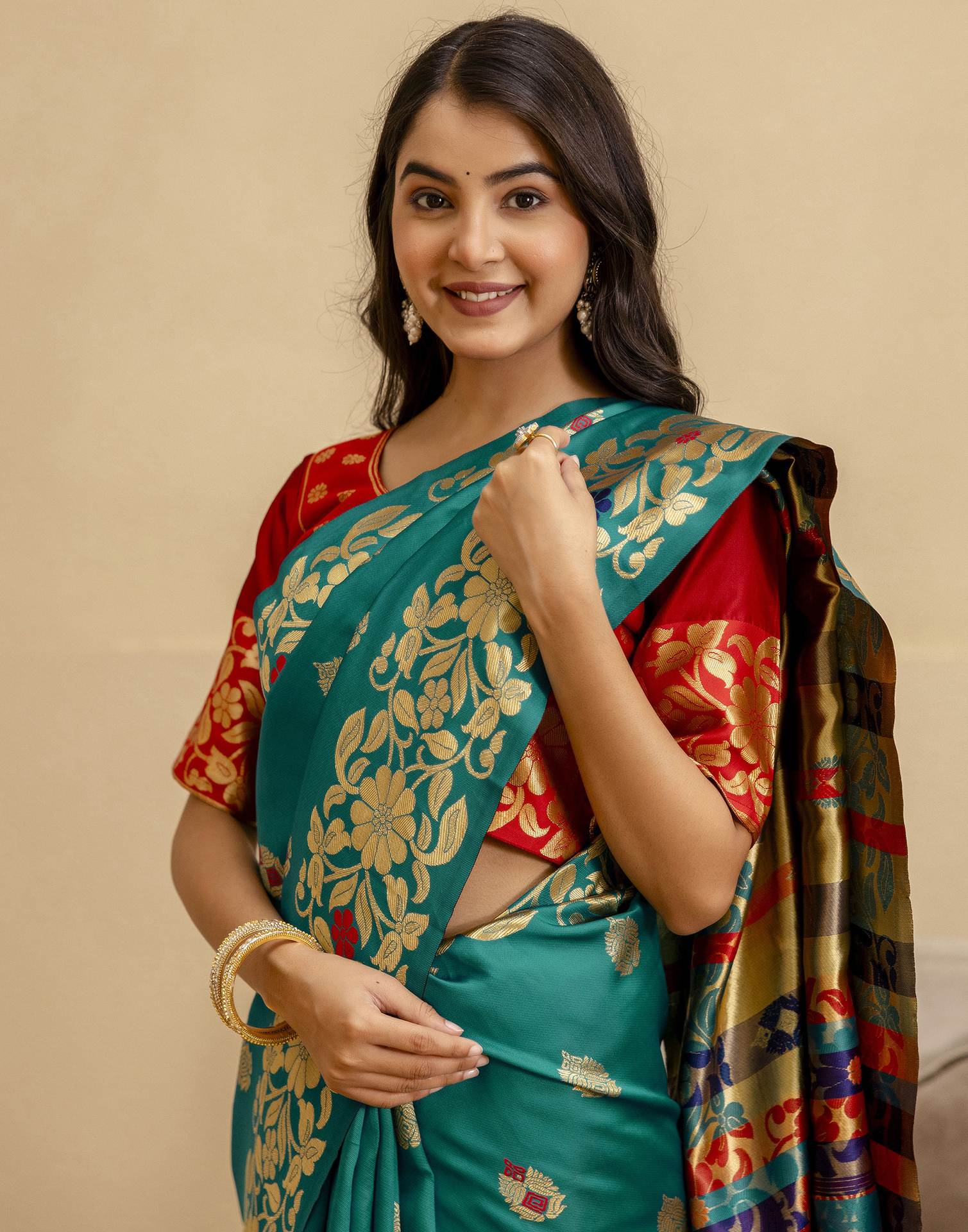 Teal Green Silk Woven Saree