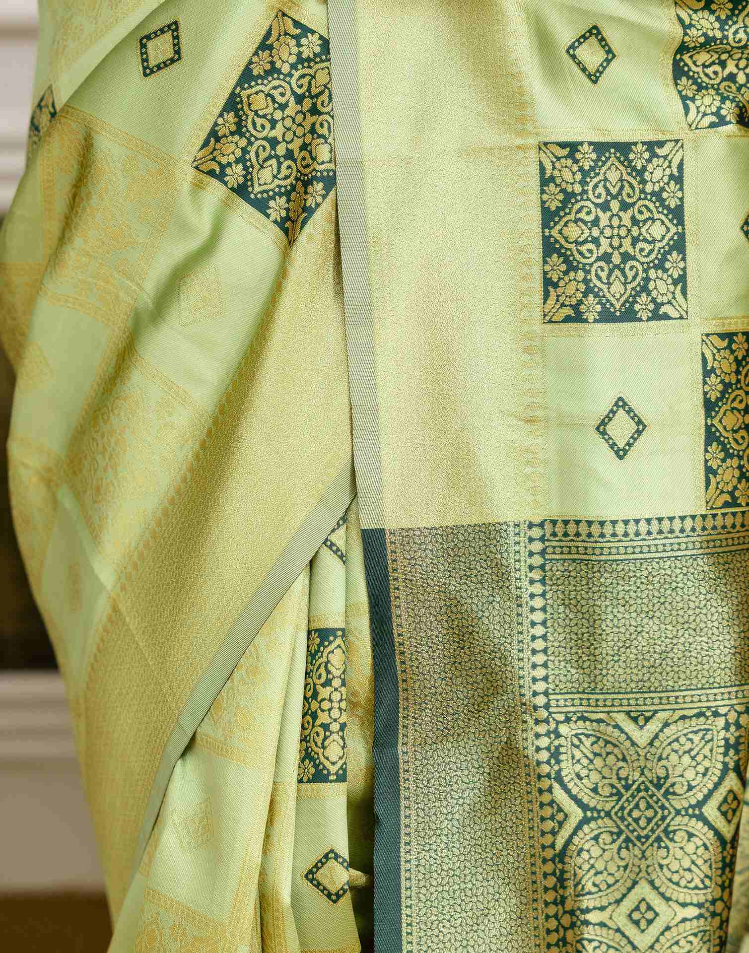 Pista Green Silk Woven Saree