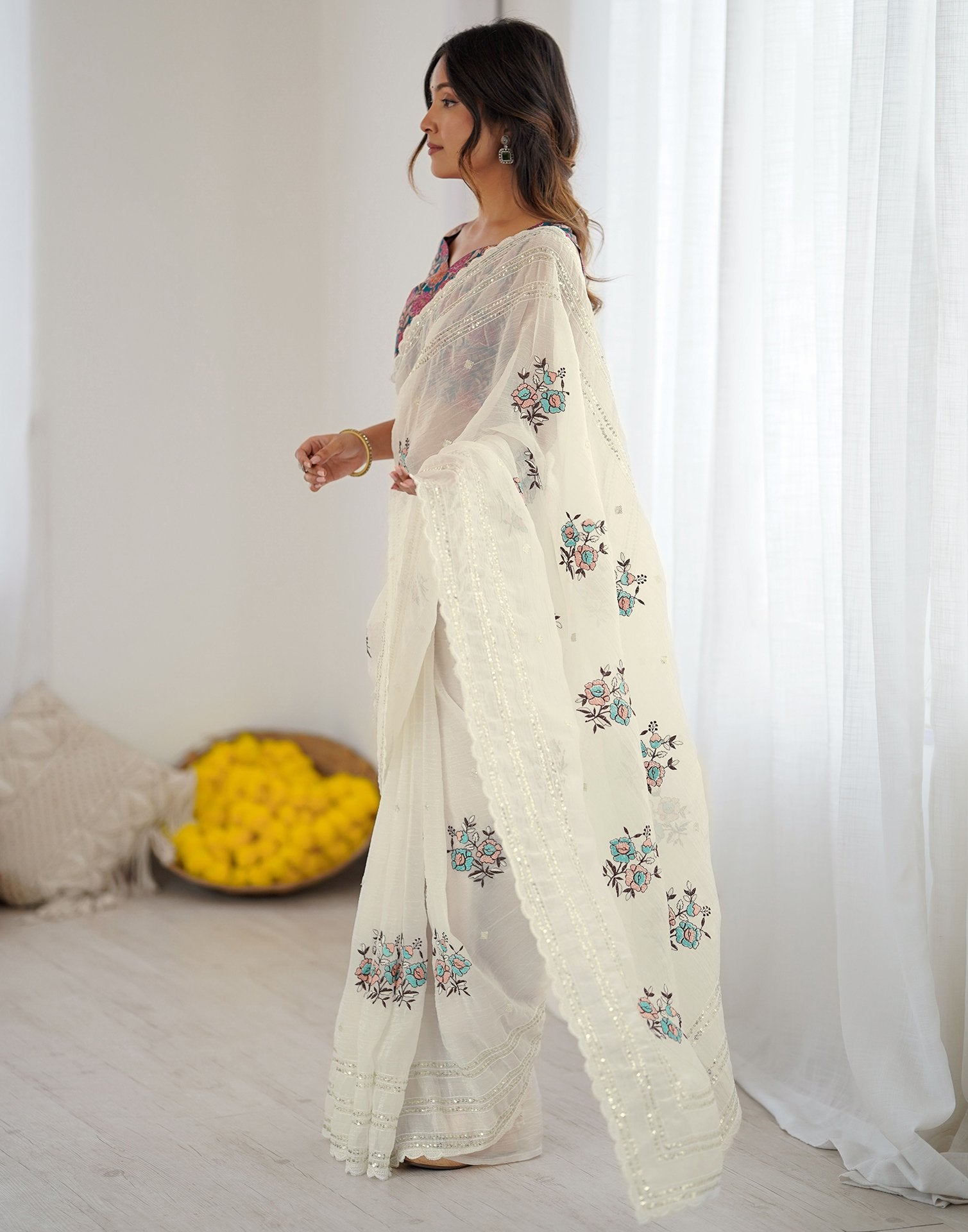 Off White Tissue Silk Sequence Embroidery Saree