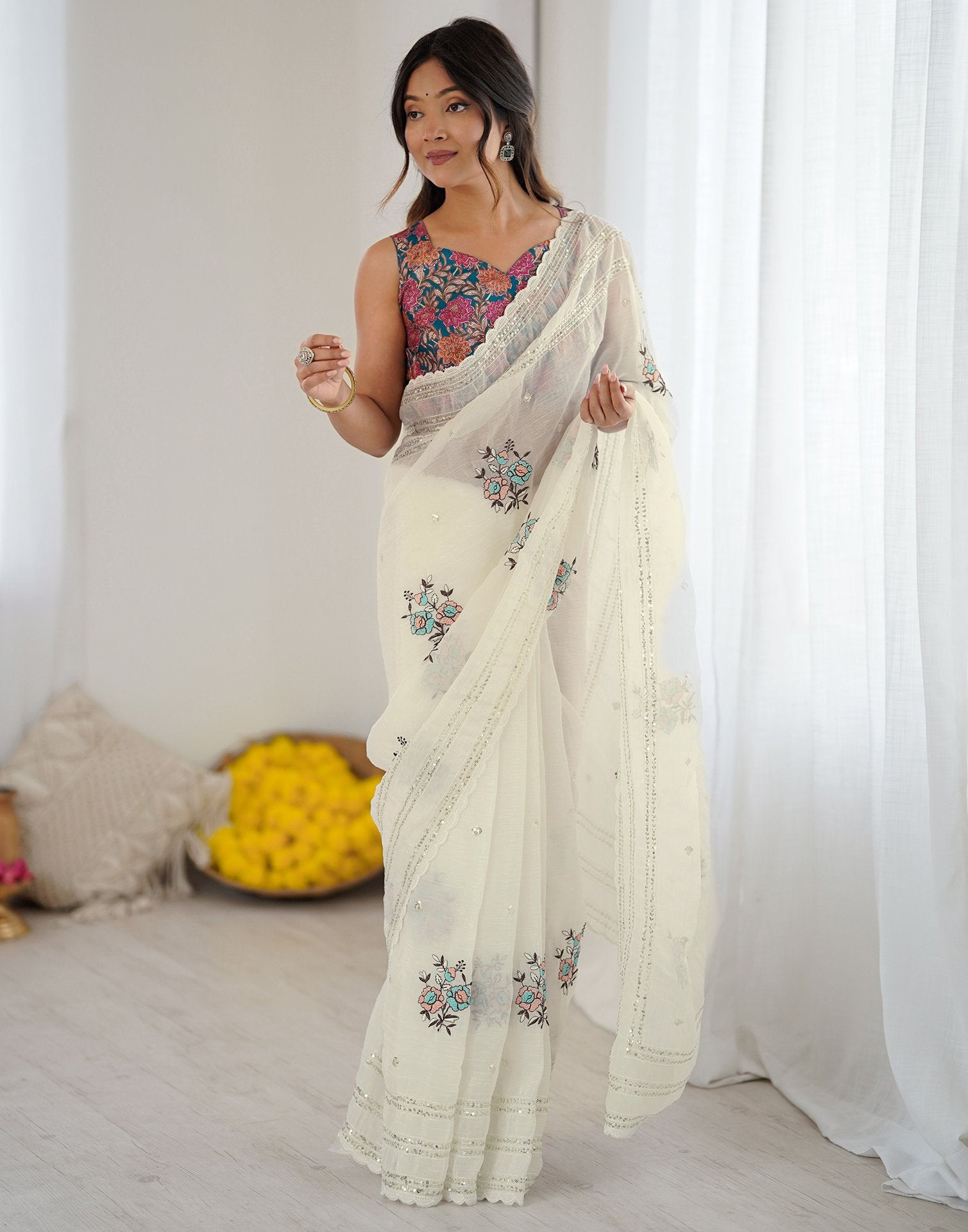 Off White Tissue Silk Sequence Embroidery Saree