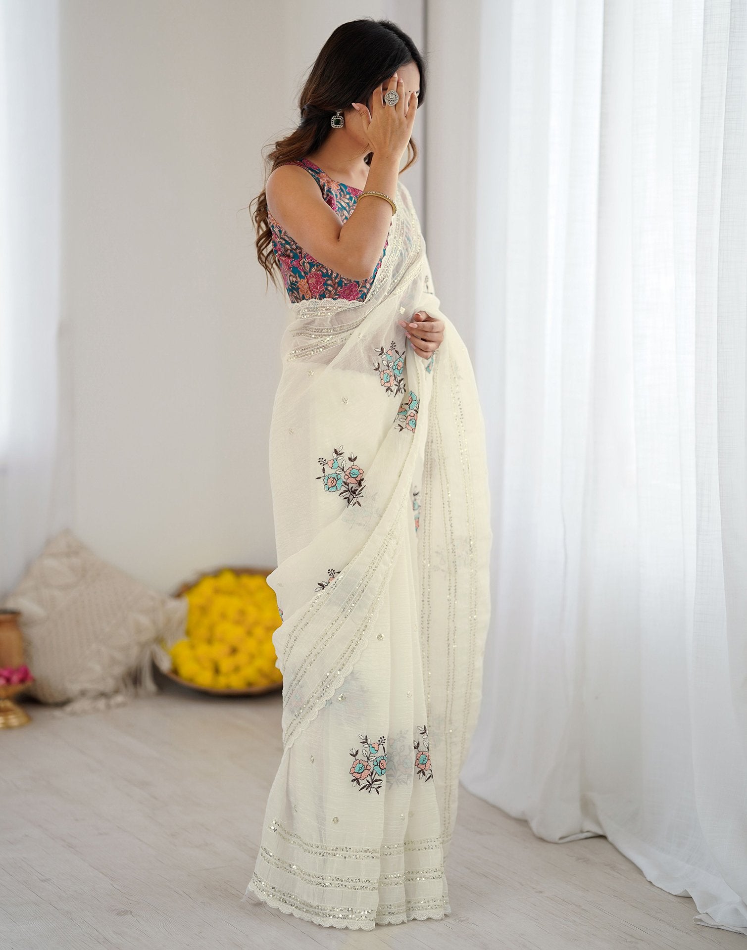 Off White Tissue Silk Sequence Embroidery Saree
