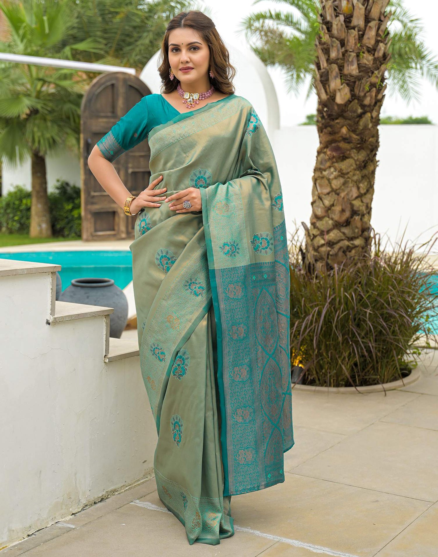 Teal Green Silk Woven Saree