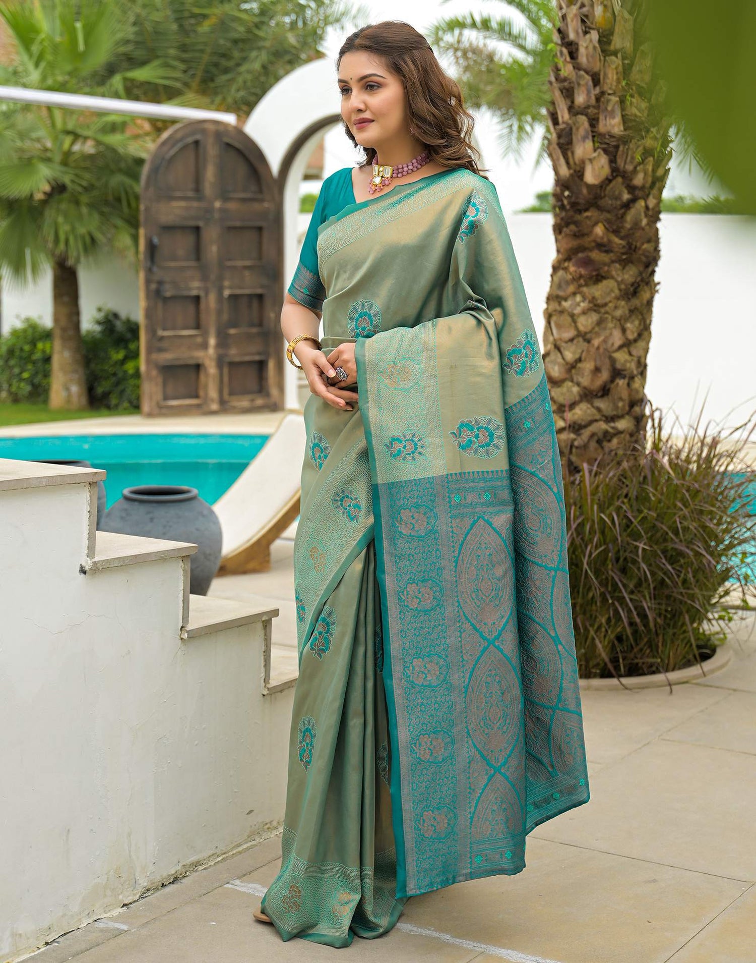 Teal Green Silk Woven Saree