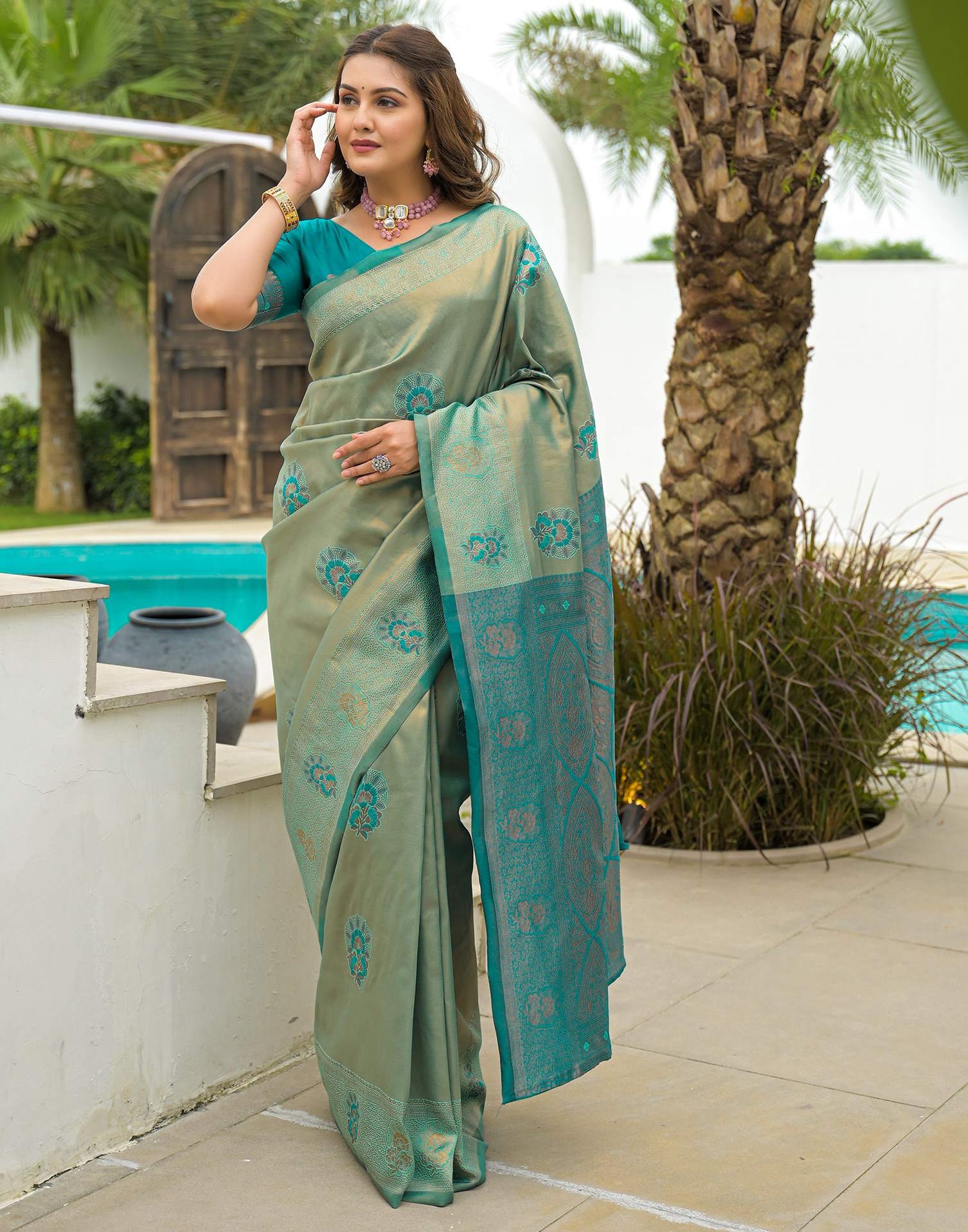 Teal Green Silk Woven Saree
