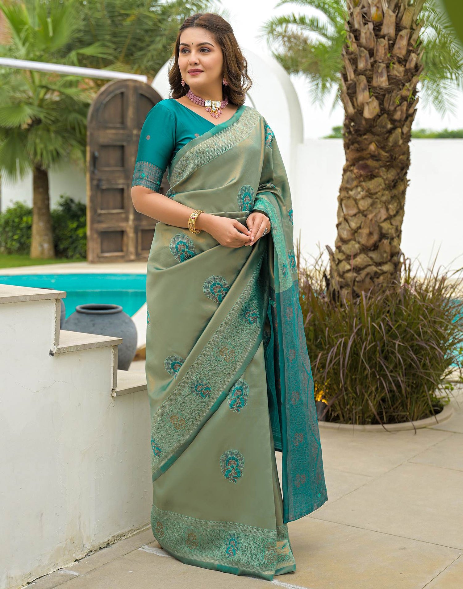 Teal Green Silk Woven Saree