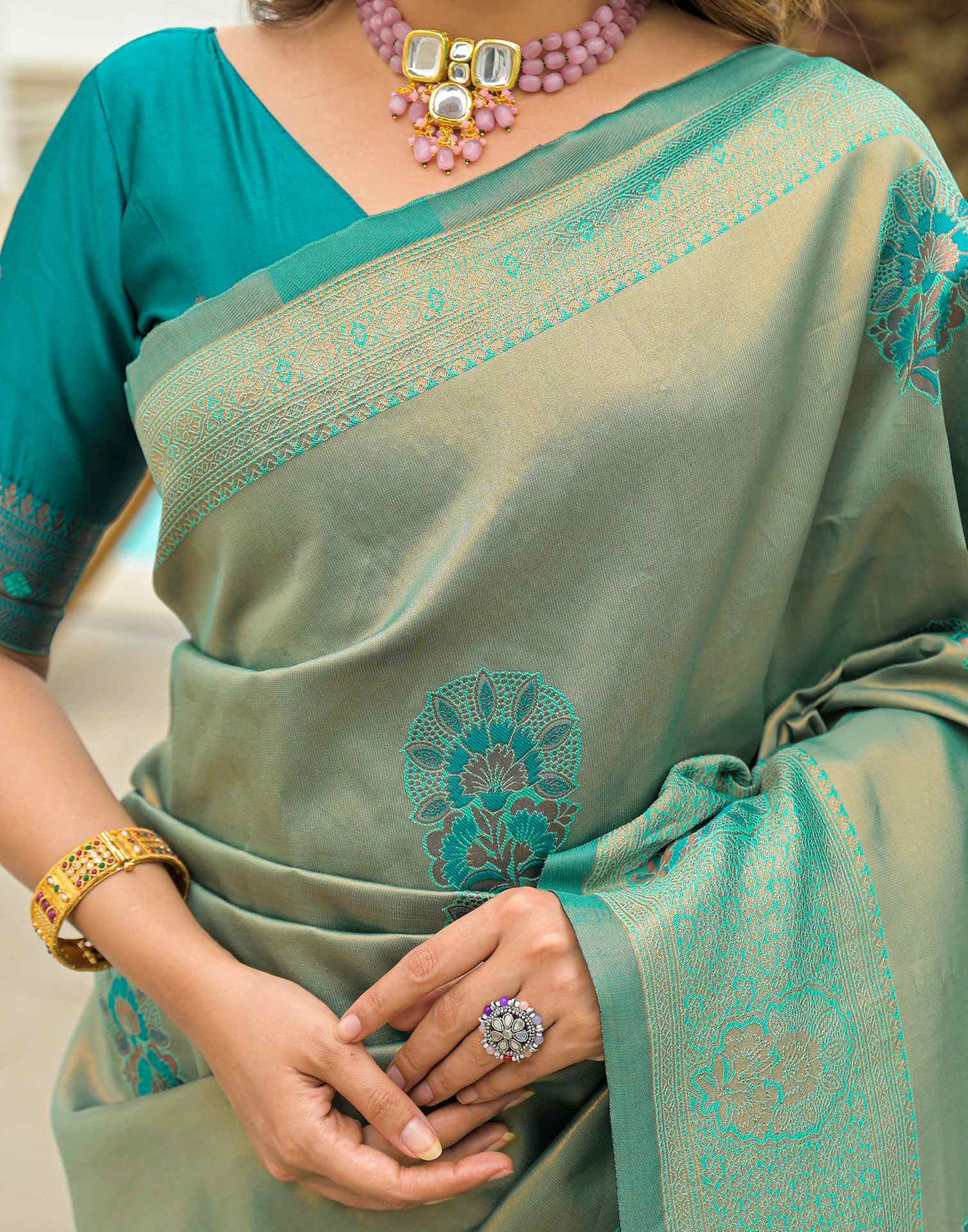 Teal Green Silk Woven Saree