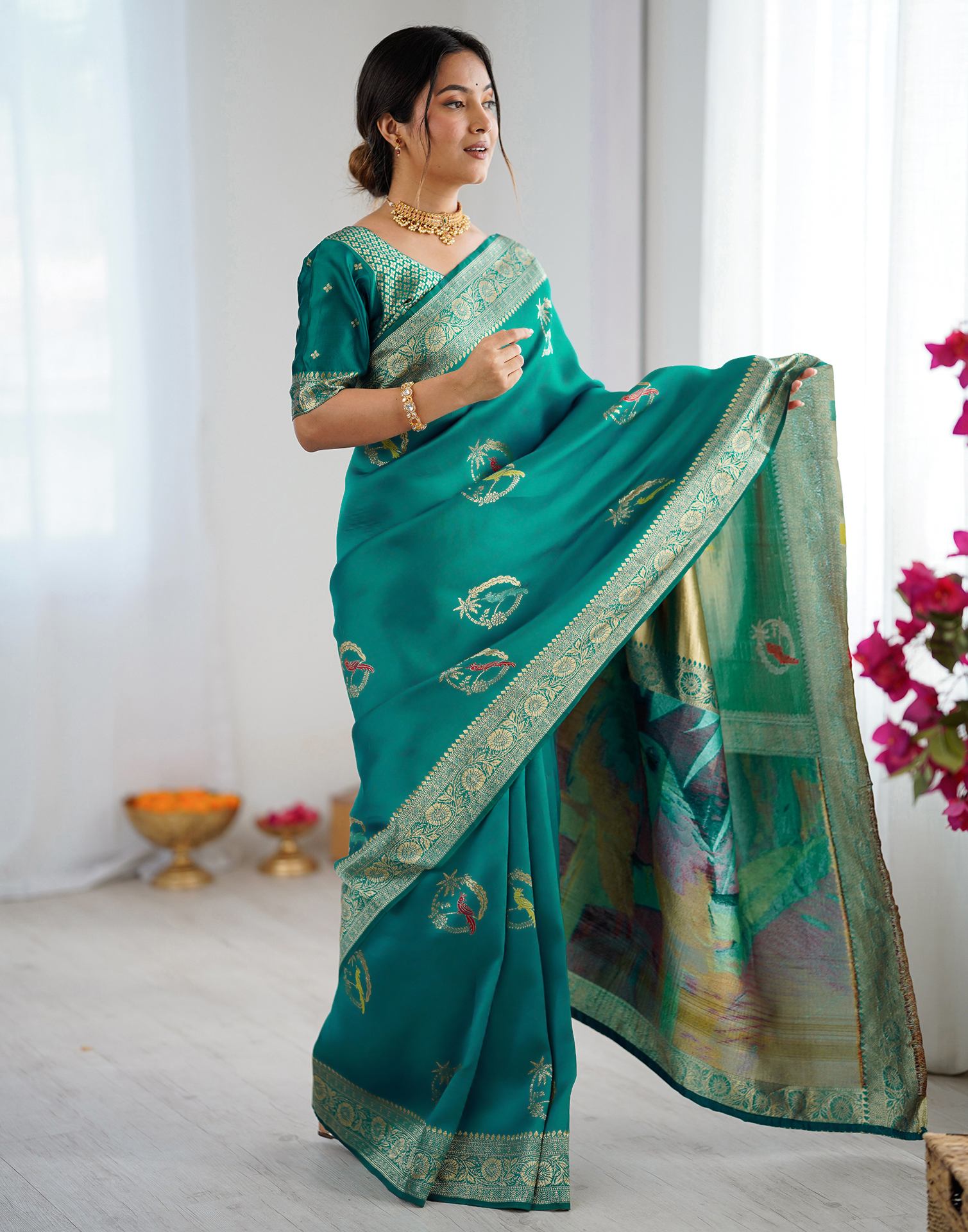 Teal Green Silk Woven Saree